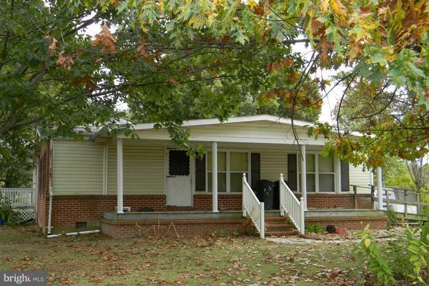 Nice home with 3 BR and 3 Baths ,Huge Master Suite addition with sitting area and full bath . Situated on a .60 acre level lot. Detached garage with paved driveway. Huge shed ,side porch and large covered front porch w/handicap ramp , Home renovated with complete fresh paint ,carpet and vinyl flooring in three baths and kitchen.$500 for a Home Warranty for owner  occupants,Cash only offers accept