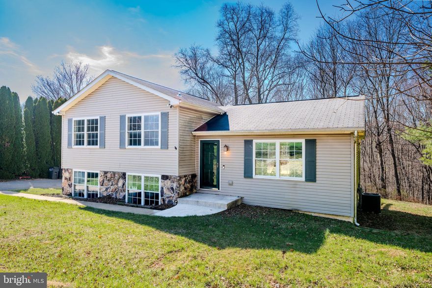 Nestled in the serene enclave of Chazadale North, this exquisite split-level residence offers a harmonious blend of comfort and sophistication. Spanning over 1,800 square feet, this home is designed for those who appreciate the finer things in life. The fully finished walkout basement provides an ideal space for entertainment or relaxation, seamlessly connecting indoor and outdoor living. The exterior, adorned with elegant vinyl siding, exudes timeless charm while the expansive 1.02-acre lot invites endless possibilities for outdoor enjoyment. Imagine hosting gatherings on your private grounds or simply unwinding in the tranquility of your surroundings. Inside, the layout is thoughtfully crafted to enhance both functionality and style. The absence of a pool allows for a low-maintenance lifestyle, giving you more time to explore the nearby amenities and natural beauty of the area. With ample driveway parking, convenience is at your fingertips. This property is not just a home; it's a lifestyle. Experience the peace of mind that comes with living in a well-established community, where every detail has been considered for your comfort and enjoyment. Whether you're entertaining guests or enjoying a quiet evening, this residence is a sanctuary that invites you to create lasting memories. Embrace the luxury of space, privacy, and the opportunity to make this stunning property your own.