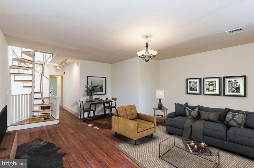 Available Early July:

This awesome and unique apartment is ready to welcome it's next tenants! This is a bi-level space with an upper level loft, offering tons of character, original details, laundry in-unit, thoughtful updates, hardwood floors, and lots of privacy for roommates. Your entryway stairs open up into your living room, where a balcony overlooks the tree lined street below, and floods the space in natural light. Continue back through this level and you'll find the bathroom, first bedroom, dining room, and kitchen. The bathroom has a full tub with a stained glass transom window for natural light-- one of the charming details that you'll love about this space! The bedroom has a closet with your washer and dryer, so no more trips to the laundromat! The dining room has a beautiful contemporary chandelier, and a cutout to the kitchen with bar seating, tons of storage, tile backsplash, and new appliances. Take the spiral staircase to the loft, complete with skylights, exposed whitewashed brick, and a beautiful potted tree that stretches up through the staircase and into the upper level.

About the Neighborhood:

Located just blocks from Clark Park in West Philly, this location does not disappoint! Close proximity to University City, Malcolm X Park, and Cedar Park. Enjoy convenient public transit for easy access throughout the city. You'll be directly on Baltimore Ave, host to fantastic hotspots including Booker's Bar & Restaurant, Loco Pez, Dahlak, Mood Cafe, Carbon Copy, Common Beat Music, Amari's, and countless more!

Lease Terms:

Generally, first month, last month, and one month security deposit due at, or prior to, lease signing. Other terms may be required by Landlord. $55 application fee per applicant. Pets are conditional on owner's approval and may require an additional fee and/or monthly pet rent, if accepted. (Generally, $500/dog and $250/cat, and/or monthly pet rent). Tenants responsible for: electricity, gas, cable/internet, and a $50/month flat water fee. Landlord Requirements: Applicants to make 3x the monthly rent in verifiable net income, credit history to be considered (i.e. no active collections), no evictions within the past 4 years, and must have a verifiable rental history with on-time rental payments. Exceptions to this criteria may exist under the law and will be considered.