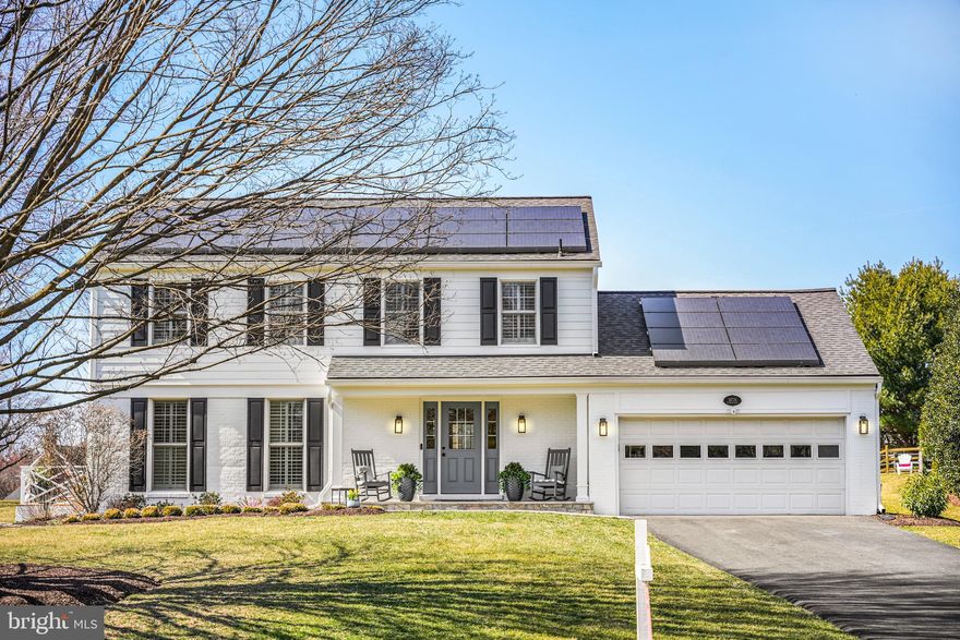 Immaculate, Exquisitely-Updated Colonial in Top Great Falls Neighborhood * 3 Fully-Finished Levels * Nearly 3,100 Square Feet of Finished Living Space * 4 Bedrooms, 2.5 Bathrooms * Meticulously Renovated Both Inside & Out * New HardiePlank Siding & Trim (2024), New Solar Panel System (2023), New Roof (2019) & Much, Much More * Charming Front Porch with New Glass Door, Beadboard Ceiling & Flagstone Walkway * Extensive, Character-Rich Hardwood Flooring on Both Main & Upper Levels * Gourmet Kitchen with Fresh White Cabinetry, Granite Countertops, Stainless-Steel Appliances, Enclosed Pantry & Recessed Lighting * Elegant Living Room Flooded with Natural Light from Tall Windows * Gracious Dining Room with New Double Glass French Doors to Cozy Side Deck * Handsome Family Room with Newly-Whitewashed Brick Fireplace & New Glass Door to Back Deck * Luxurious Primary Suite with New Primary Bathroom, Large Walk-In Custom Closet, Lighted Ceiling Fan & Additional Recessed Lighting * 3 Additional Spacious Upper-Level Bedrooms with Large Windows, Lighted Ceiling Fans & Recessed Lighting * Fully-Finished Lower Level with Expansive Open Recreation Room, Large Office/Den/Bonus Room & Spacious Storage/Utility Room * Main-Level Laundry / Mud Room with Built-In Cabinetry * All Rooms Wired with Cat6 Ethernet Cable for Optimal High-Speed Internet Performance * Attached 2-Car Garage * Spectacular, Sprawling Backyard Perfect for Both Relaxing & Entertaining with Large Deck & Adjoining Flagstone Patio * Gorgeously Landscaped Grounds with Extensive Perennial Plantings for Breathtaking Seasonal Color * Ideally Sited Directly Across the Street from Acres of Park-Like Community Open Space * Nestled within the Highly Sought-After, Friendly "Fox Vale Farm" Neighborhood of Great Falls-- featuring Meandering Sidewalks & Abundant Common Space * Located Just Minutes from Great Falls Village Center, Fine Shops & Dining * Convenient to Multiple Commuting Routes, Metro Silver Line & Dulles International Airport * Top-Rated Schools Including Forestville Elementary, Cooper Middle & Langley High School   **A Truly Special Sanctuary in Upscale Great Falls... Welcome Home!**