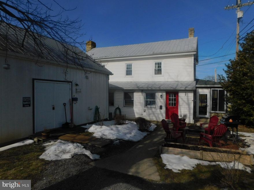 Great opportunity to live and work in downtown Wardensville. Located in a prime spot at the corner of Main and Carpenter. The  "Pilgrim House" is an well known property in  Wardensville. Property has been updated throughout the recent years. Main level has a laundry  room, kitchen with SS appliances, Living room with fireplace, full bathroom and winding staircase to the second level. The second level has  a large primary bedroom and two additional bedrooms with all sharing a full bathroom. The house tons of ambience with corner cupboard and other built-ins. There is a nice relaxing all weather side porch off of the kitchen.
There is a quaint guesthouse behind the main house that is currently used as a business office, but could be converted to nice living space. Main level has two large rooms and a smaller room that serves as a kitchen and a full bathroom. The second level has a huge room currently used as a bedroom. 
The backyard also has a shed and driveway for parking. This property has maximum  exposure to possible cutomers driving through Wardensville back to DC and Northern Virginia.