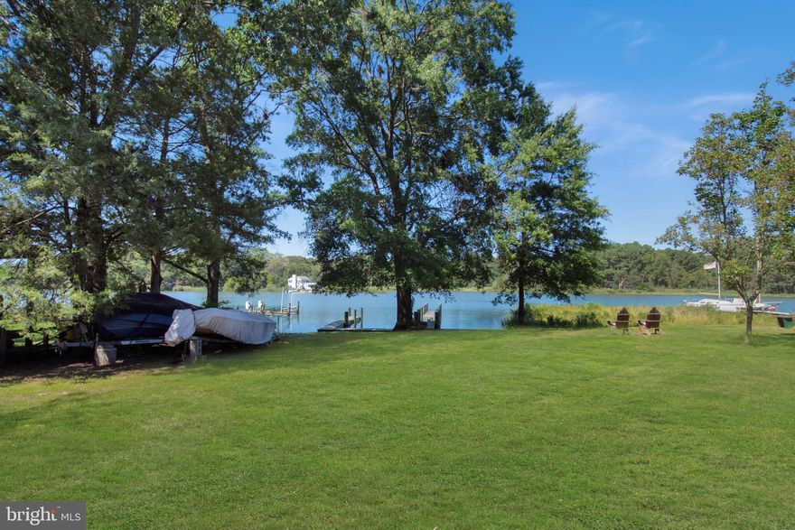 Level, open 60' wide waterfront lot on Carr's Creek with access to Chesapeake Bay! Beautiful, serene views. Bulkhead, 2 piers and small boat launch ramp are in place. Public sewer with sewer tap in place! The home next door at 968 Main Street is also listed for sale. Purchase both and you will have it all, a nice home, the waterfront features and the major investment value of a waterfront buildable lot, or build your new home and have the existing one as an investment property! Check out the waterfront home listing at 968 Main Street, Deale.  Great location 45 minutes from Wash D.C. or BWI airport near Baltimore. 25 minutes from historic Annapolis.  Within a few minutes of waterfront restaurants, marinas, shops, library and more! Deale Beach also has a waterfront community clubhouse.