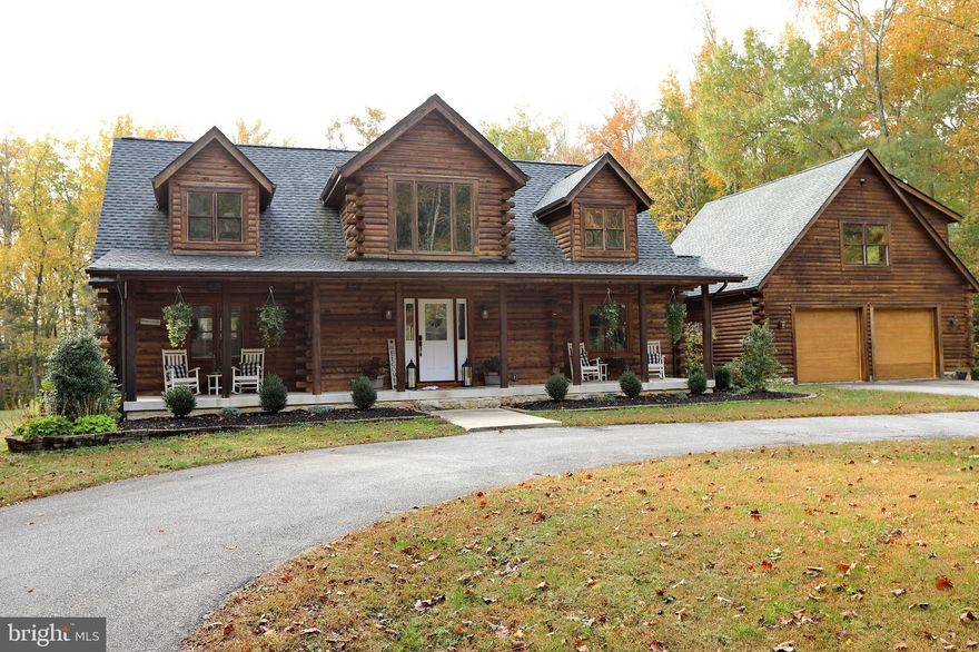 Welcome to Hidden Creek Farm, featuring 328 spectacular acres of waterfront property adorned with a luxurious Main Cabin, Guest Cabin, Metal Barn, Horse Barn and 2 hunting cabins. Travel the 1 mile of fully paved driveway to arrive at the picture perfect Main Cabin featuring 4 bedrooms, 3.5 baths and 3 levels of gorgeous living space. The main level boasts a gourmet kitchen, living room, screened-porch, and primary suite  with walk in closet, private entrance to the jacuzzi deck and newly remodeled en suite. A spacious mudroom, half bath and laundry room round out the main level. The upper level features two bedrooms with ample closet space and a full bath in the hallway. The large, newly carpeted and painted, lower level presents endless opportunity for additional rec space and hosts a separate theater room w/ screen and projector. The spacious loft bedroom features its own, newly remodeled, bathroom and overlooks the sanctuary-like backyard with an expansive, newly refinished deck and brand new (2020) inground, saltwater pool with pebble bottom and waterfall.  The Guest Cabin was fully remodeled in 2018, and the large commercial metal garage, with heated floors, built in 2019.  Miles of private trails wrap through some of the best hunting ground in all of North America and make this the perfect home for outdoor enthusiasts or anyone looking to create their own retreat just 45 short minutes outside of DC.