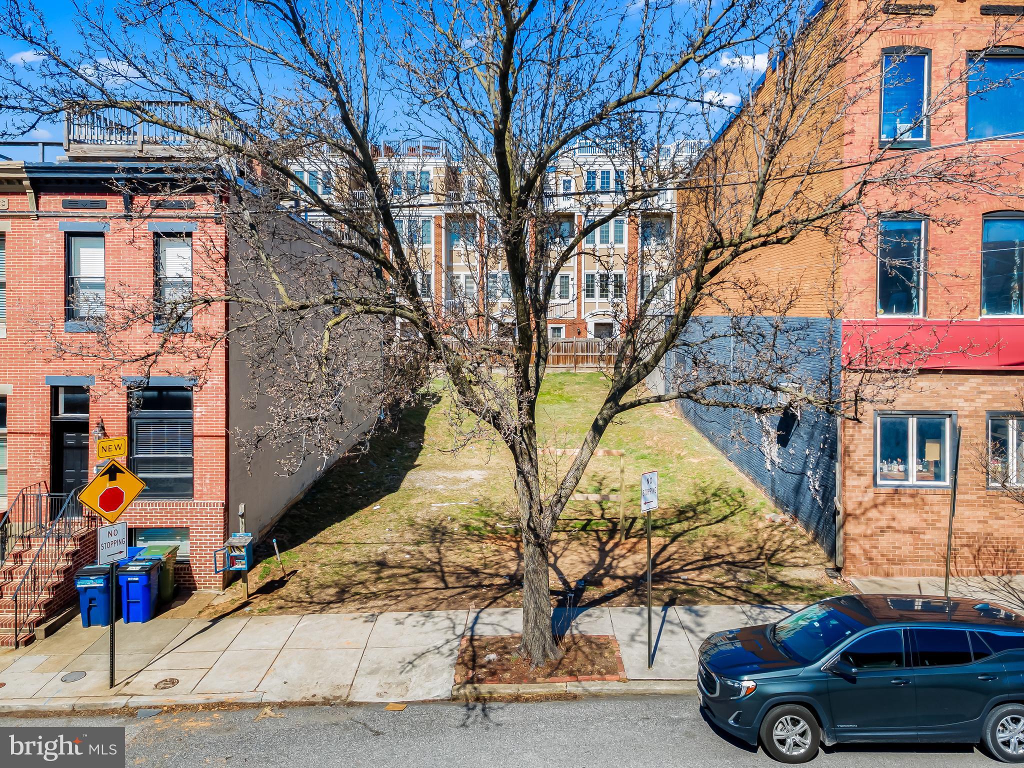 3518 O'Donnell Street is an excellent location for two large townhomes or one huge townhome. The 41.5 X 100-foot lot is located on the border of Canton and Brewers Hill. The concept in our images is only one option for redevelopment and would need final approval. We have a popular architect familiar with the project and could help a buyer take it in a few different directions. No appointment is required, so go see it anytime you want! The latest concept in the documents section has two homes that are 3,928 sqft each, with two parking spots for each home in the back of the project. Call the listing agent with questions.