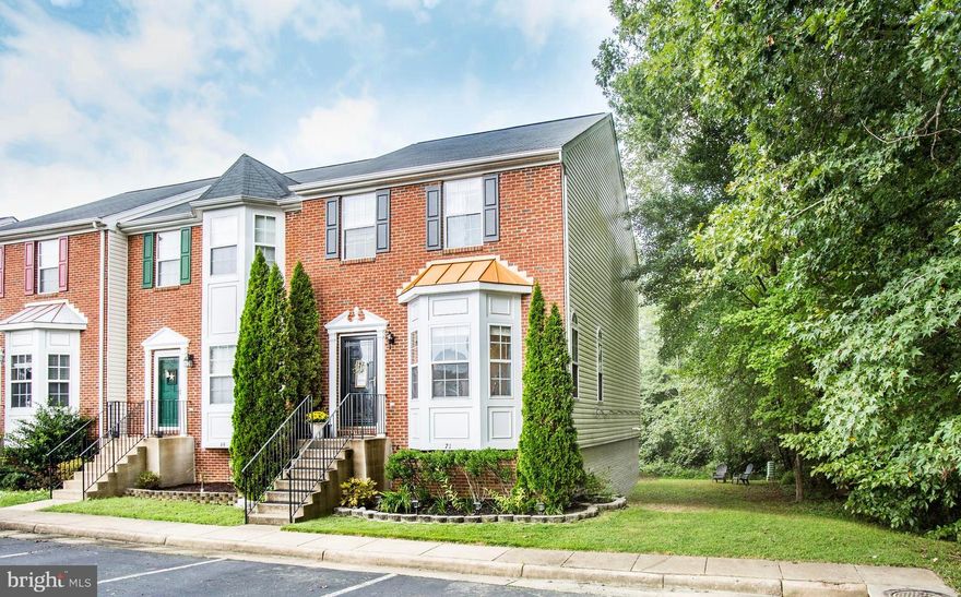 Fantastic 3 Level Luxury Brick END-Unit wPrivate Deck,Patio & TREED Views!Contemporary Floorplan w9Ft Ceilings on Main*Huge Eat-In Kitchen wGranite Counters Opens to Living Rm & Dining Rm*Vaulted Owners Suite wSPA Soaking Tub,Shower & Double Closets*2 Additional Bedrooms UP wHall Bath PLUS Lower Level 4th Bedroom(NTC) w3rd Full Bath*Cozy GAS Fireplace in WALKOUT Family Rm*GREAT Schools & Location