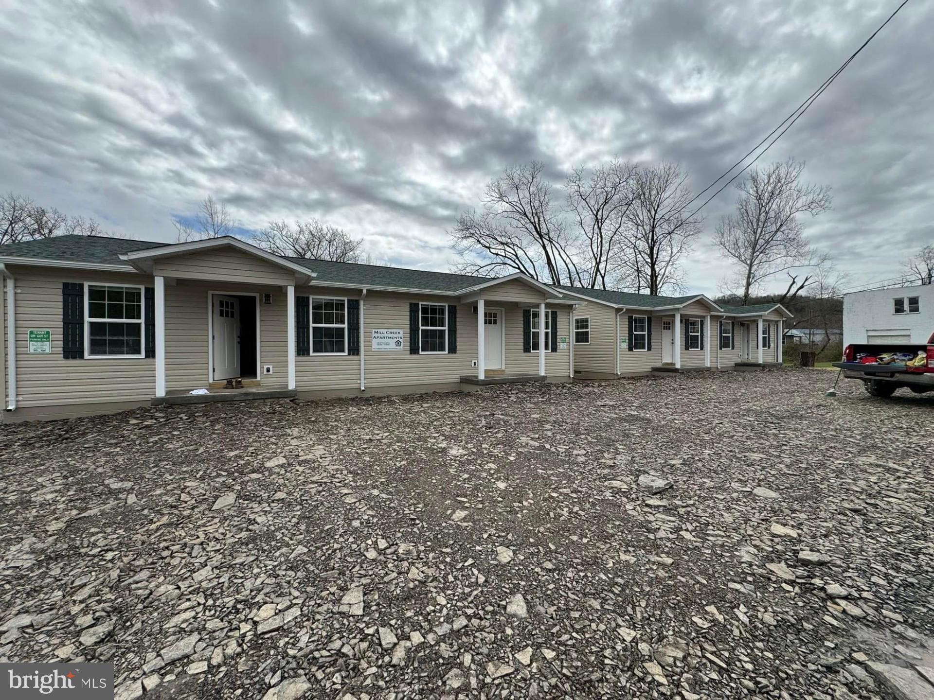 TRULY AN INVESTOR'S DREAM! MULTI-UNIT APARTMENTS FOR SALE IN BURLINGTON, WV.........A TOTAL OF (4) 2 BEDROOM, 1 BATH APARTMENTS WHICH WERE NEWLY CONSTRUCTED IN 2024, ALL UNITS HAVE HAD 100% OCCUPANCY SINCE COMPLETION, WITH NO DELINQUENCIES. THE APARTMENTS EACH OPERATE OFF OF CITY WATER, A PRIVATE CLASS 2 SEPTIC SYSTEM, AND EACH UNIT HAS IT'S OWN INDIVIDUAL 200 AMP ELECTRICAL SERVICE. THIS PROPERTY IS A LOW MAINTENANCE MONEY MAKER, THE APARTMENTS WERE CONSTRUCTED WITH HIGH GRADE MATERIALS AND CRAFTSMANSHIP, WITH MODERN DAY EFFICENCY. THERE IS ALSO PLENTY OF ROOM TO RAISE THE MONTHLY RENT ON THESE. I HAVE INCLUDED THE BUILDING MATERIAL SPEC SHEET AND THE FINACIAL RENT ROLL WITH YEARLY TOTALS IN THE PHOTOS AND UNDER THE DOCUMENTS TAB. IF YOU ARE LOOKING FOR AN INVESTMENT THAT YOU CAN COUNT ON FOR MANY MANY YEARS TO COME, THIS IS IT! THE OWNERS PAY FOR TRASH REMOVAL AND WATER, EACH TENANT PAYS FOR THEIR OWN ELECTRIC.