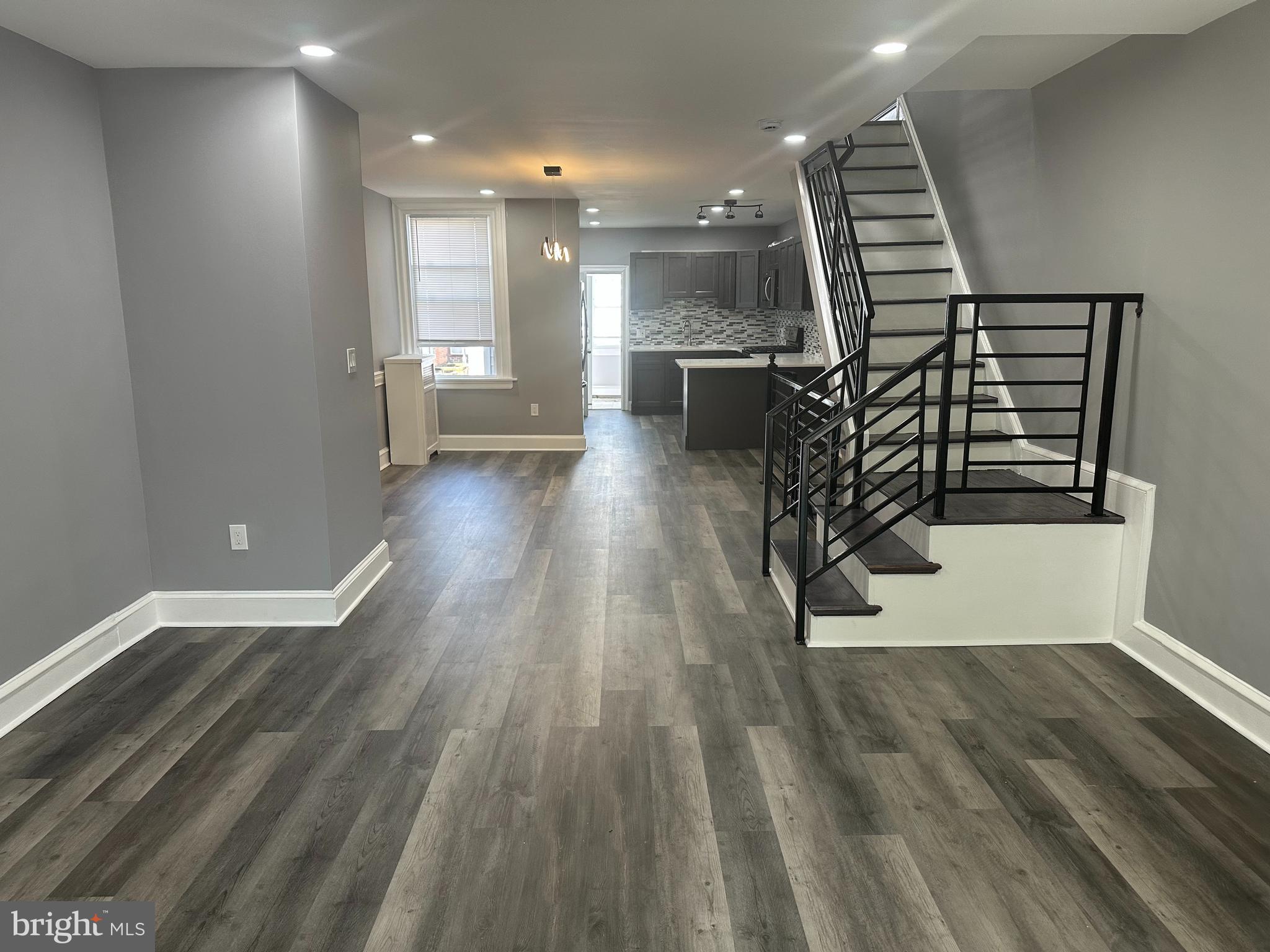 Step into modern comfort and timeless charm with this beautiful remodeled townhouse, ideally situated in the vibrant Olney neighborhood. Featuring three generous bedrooms and two full bathrooms, this move-in-ready home offers the perfect blend of style and functionality. Inside, you'll be welcomed by a bright, open layout with all-new finishes throughout—from updated flooring and fixtures to a sleek, modern kitchen. The finished basement adds incredible versatility with a bonus room, a full bathroom, and direct garage access—ideal for guests, a home office, or extra living space. Additional perks include an attached garage and off-street parking. Beyond the home, Olney offers a true sense of community, with access to local parks, highly rated schools, and a variety of shops, restaurants, and community events. With its modern upgrades, flexible living space, and unbeatable location, this townhouse is more than just a place to live—it’s a place to thrive. The seller is also offering a free 1 year paid warranty so you have additional peace of mind! Don’t miss your chance to make it yours!