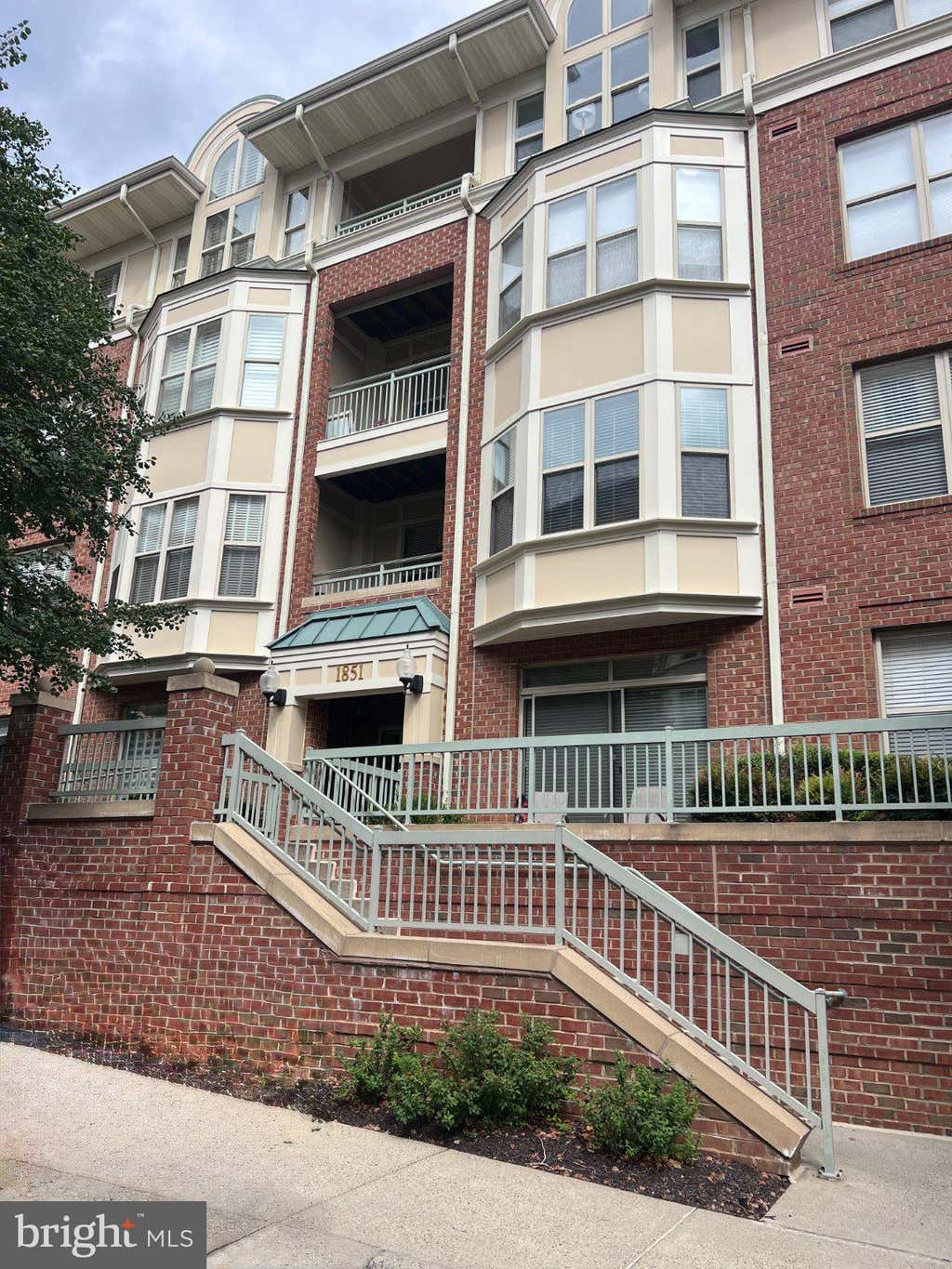 Photo of 1851 Stratford Park Place #401, RESTON, VA 20190 (MLS # VAFX2336922)