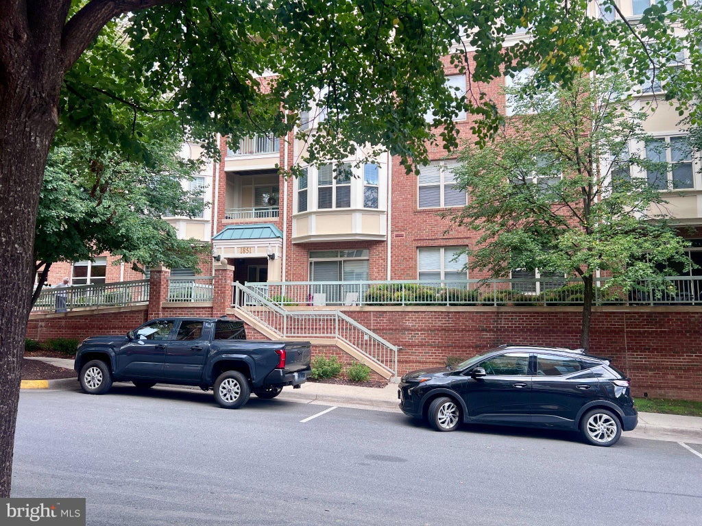 Photo of 1851 Stratford Park Place #401, RESTON, VA 20190 (MLS # VAFX2336922)