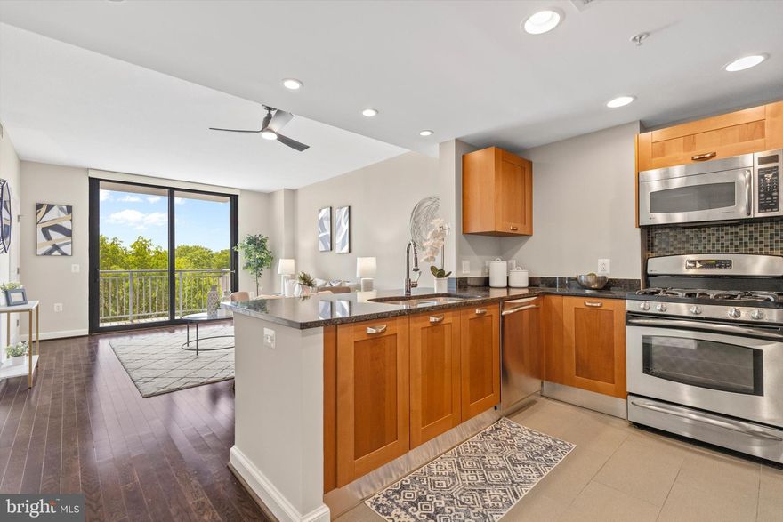 Step into this charming 6th-floor unit right across from Huntington Metro Station. This lovely space features beautiful hardwood floors, high ceilings, and a spacious kitchen with granite countertops and stainless steel appliances.

Perfect for hosting get-togethers, the open layout flows smoothly, and the private balcony offers a peaceful spot to unwind. Treat yourself to a relaxing soak in the jetted tub in the full bathroom. Stay organized with ample storage, a custom closet system, and an additional storage unit. Enjoy the convenience of an in-unit washer/dryer and a garage on the same level for added security -- so no waiting for an elevator from the garage to your home!

Exceptional building features include: exclusive garage parking, a party room opening to a pool deck with an outdoor grilling area, a stunning pool area with a hot tub, a 24/7 fitness center, a cyber cafe, and a concierge at the front desk. A storage unit on the 6th floor is included in the sale. Enjoy easy access to Old Town, MGM/National Harbor, and a 2,800-meter path for walking, running, biking, or skating at the Huntington Levee/Cameron Run. Residents can join catered social events and benefit from free weekend metro parking throughout the year. This luxury unit offers exceptional value with unparalleled convenience, amenities, and location!

FHA/VA Approved & Washer/Dryer in Unit.