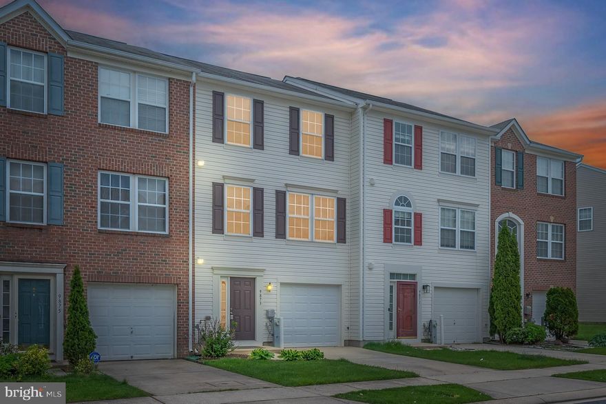 Welcome home to this beautifully refreshed townhouse in Middle River, perfectly blending comfort and modern living. Featuring 3 bedrooms, 2 full bathrooms, and 2 half bathrooms, this spacious home provides all the space you could need. The entry-level welcomes you with brand-new carpeting, a cozy living area, convenient laundry access, and entry to the one-car garage. The second floor offers an inviting main level, showcasing gleaming hardwood floors in the spacious living and dining areas, along with stylish tile flooring in the generously sized kitchen. Upgraded countertops, cabinetry, and ample table space make this kitchen perfect for everyday living and entertaining. A desirable bump-out provides extra room to relax or entertain, and sliding doors lead out to the back deck—perfect for grilling or enjoying a quiet moment outdoors. Retreat to the third floor, which features brand-new carpeting throughout its three comfortable bedrooms, including a luxurious primary suite with a private bathroom boasting a soaking tub and separate shower. Freshly painted from top to bottom, this home feels brand new and move-in ready. With a one-car garage, driveway, and grassy backyard space, it truly checks every box. Schedule your showing today—this one won't last long!