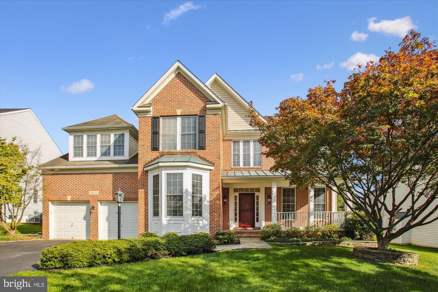 This stunning residence features a brick front and a beautiful slate walkway leading to a covered porch. Step inside to a welcoming two-story foyer adorned with hardwood floors that flow seamlessly throughout the main level. Enjoy working from home in the conveniently located main level study/office, featuring a spacious bay window that lets in natural light. The combined living and dining rooms create an ideal open space when entertaining friends and family. The expansive eat-in kitchen is a chef's delight, showcasing stone countertops, 42" cabinets, stainless steel appliances, a gas cooktop, and double wall ovens with convection settings. A spacious center island enhances the kitchen's functionality, making it the heart of the home.  And let’s not forget the multi-functional command center that doubles as a mini-office or homework station.  The adjacent family room, complete with a cozy stone wood-burning fireplace, is perfect for the upcoming fall and winter evenings. The kitchen and family room include a 4-foot extension, maximizing the living space.  UPSTAIRS, you'll find generously sized bedrooms and several bathrooms! The primary bedroom suite features a sitting area, tray ceiling, and a walk-in closet with custom built-in organizers. The private bath includes separate vanities, a soaking tub and a shower with built-in bench. There are four secondary bedrooms, including one with an ensuite full bath and another that has been thoughtfully converted into a convenient bedroom-level laundry room. The LOWER LEVEL rec room serves as a perfect gathering space for game nights and movie watching. A separate finished “flex space” offers endless possibilities – most recently used as a home gym. A full bath is conveniently adjacent.  French doors allow natural light into this level and also leads you outside to the fenced rear yard and slate patio, ideal for outdoor dining and gathering around a fire.  The sellers are leaving the new owners 1.5 cords of wood to enjoy!  Situated on a quiet cul-de-sac in a desirable neighborhood, this home enjoys access to a community pool, top-rated schools, and the growing options of restaurants and amenities in Urbana. Don’t miss your chance to make it yours!  OFFERS DUE BY MONDAY, 10/21 at 4:00PM.