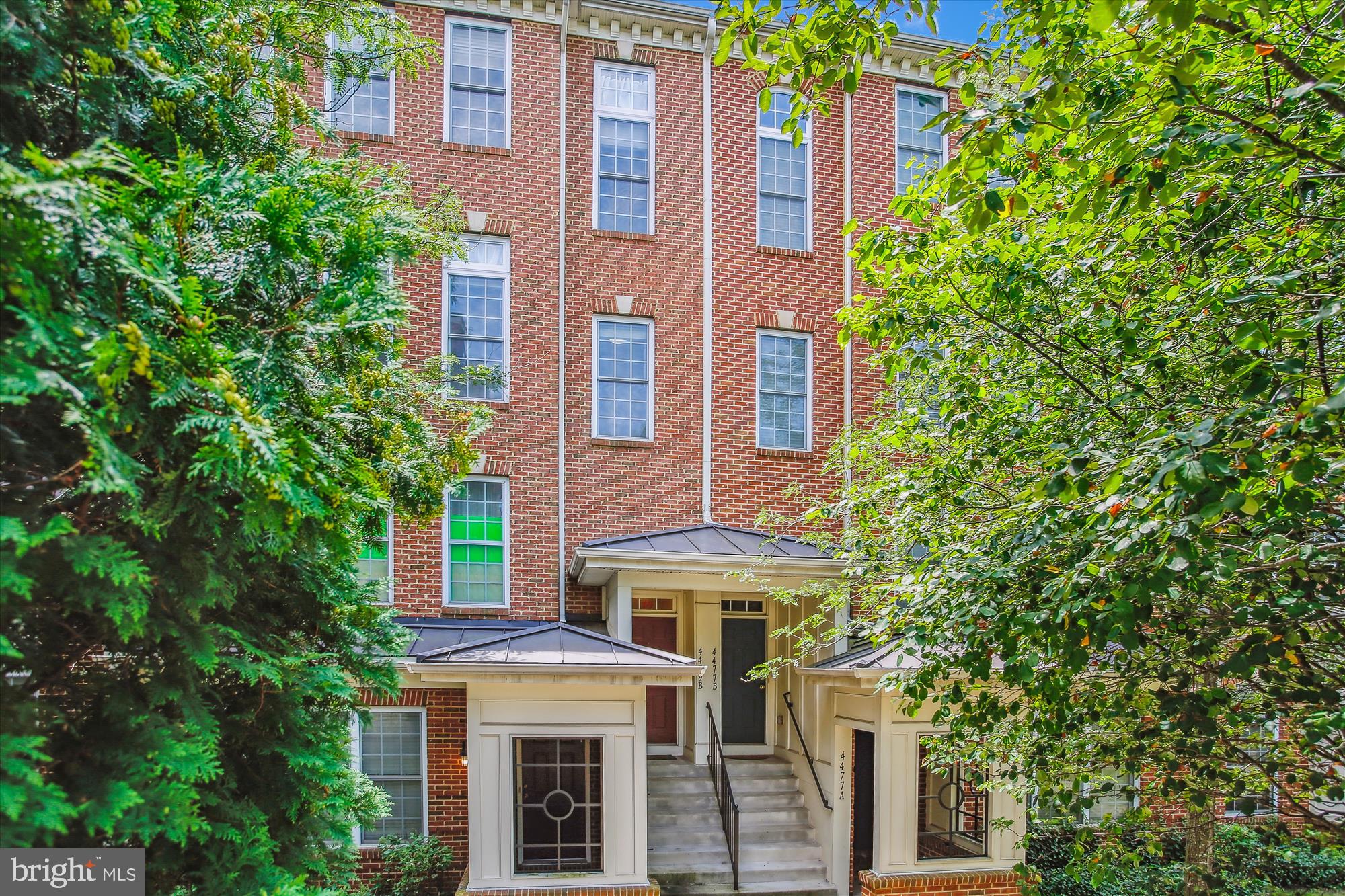 Stunning Two-level Townhouse-style Condo with 1,866 square feet of light-infused space with 3 Bedrooms and 2.5 Baths and One-car Garage in convenient East Market. Enjoy Urban Living, walking to Whole Foods and Starbucks. Don't feel like cooking tonight? Grab wine and a light dinner at Whole Foods, or pick a restaurant to walk to. Gleaming hardwood floors throughout main level. Generous Living Room/Dining Room are filled with natural daylight. The gourmet Kitchen offers rich wood cabinetry, granite countertops and stainless-steel appliances. It opens onto a private balcony. A Family room is open to the Kitchen and enjoys a Gas Fireplace, which can be viewed from most of the main level. A Powder Room completes the main level. Upstairs, the Primary Suite enjoys a cathedral ceiling, private primary bath with separate tub and shower, dual sink vanity and large walk-in closet. 2 ancillary Bedrooms offer hardwood floors and share a Hall Bath with new flooring. The Laundry is conveniently located on the Bedroom level. Updates include Hot Water Heater with Thermal expansion tank, Range Hood, Garbage Disposal, New vinyl Bathroom Floors, Interior windows for soundproofing, HVAC blower motor and condenser fan motor. The community offers a tot lot, sidewalks, and green space as well as charming garden benches to sit and relax outdoors. Walk to Whole Foods, Shops and Restaurants. CONDO FEE INCLUDES FREE SHUTTLE TO VIENNA METRO. Convenient to Fair Lakes, and FFX Gov. Center., Fairfax County Pkwy, I-66, and Rte. 50.