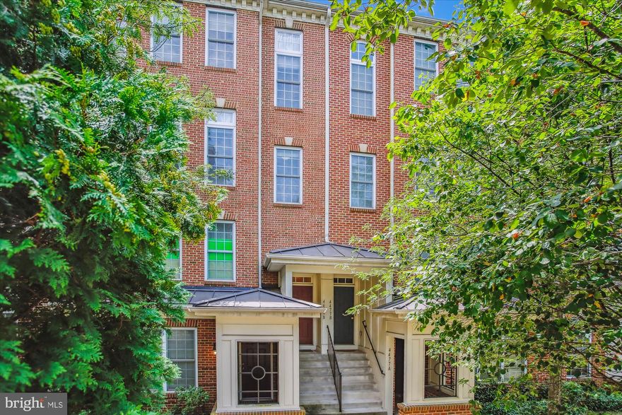 Stunning Townhouse-style Condo with 1,866 square feet of light-infused space with 3 Bedrooms and 2.5 Baths and One-car Garage & Driveway in convenient East Market.  Enjoy Urban Living, walking to Whole Foods and Starbucks.  Don't feel like cooking tonight?  Grab wine and a light dinner at Whole Foods, or pick a restaurant to walk to.  Gleaming hardwood floors throughout main level. Generous Living Room/Dining Room are filled with natural daylight.  The gourmet Kitchen offers rich wood cabinetry, granite countertops and stainless-steel appliances.. New Gas Sve 9/25  It opens onto a private balcony. A Family room is open to the Kitchen and enjoys a Gas Fireplace, which can be viewed from most of the main level. A Powder Room completes the main level. Upstairs, the Primary Suite enjoys a cathedral ceiling, private primary bath with separate tub and shower, dual sink vanity and large walk-in closet. 2 ancillary Bedrooms offer hardwood floors and share a Hall Bath with new flooring. The Laundry is conveniently located on the Bedroom level and has new LG Washer & Dryer and Laundry shelf. Updates include Hot Water Heater with Thermal expansion tank,New Washer & Dryer, Range Hood, Gas Stove,Garbage Disposal, New vinyl Bathroom Floors, Interior windows for soundproofing, HVAC blower motor and condenser fan motor. The community offers a tot lot, sidewalks, and green space as well as charming garden benches to sit and relax outdoors. Walk to Whole Foods, Shops and Restaurants.  CONDO FEE INCLUDES FREE SHUTTLE TO VIENNA METRO. Convenient to Fair Lakes, and FFX Gov. Center., Fairfax County Pkwy, I-66, and Rte. 50.