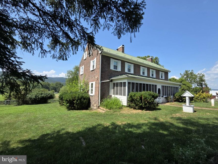 This is a once in a lifetime property you may never find again in our county.  This property is one of the largest tracts of land ever to be sold by an private property owner.   Approximately 510 +/- acres including multiple tax records.   This stunning colonial home built in 1789, yes I said 1789 per Allegany county tax records and deed transfers and is one of the oldest homes in the county.  Just imagine owning a home that was built 70 years before the Civil war.  The  solid brick home is in immaculate condition and has been owned by the same family since 1959.  This home has been  nicely maintained and the character and charm were left in tact.  The dining room has a huge wood burning fireplace capable of holding a 5 foot log and the main level living room has a dual sided wood fireplace.     There are beautiful hardwood floors and original wood (painted) ceilings. There are full length front and back porches to relax on, one being screened, The exterior brick was repointed years ago and is in excellent shape.  Rolling fields, 2 year round mountain streams, an acre pond, and walking distance to Wills Creek.  Multiple buildings are included with this sale but equipment is negotiable.  Seller says there is an estimated $200,000  worth of timber value on this property with the last cutting being approx. 20-25 years ago.  Seller prefers a sale lease back if possible for a period of time.  PLEASE NO DRIVE BY VIEWINGS and a 24 hour notice is required to view.  This is an excellent investment.  They are not making any more land anywhere and especially a larger farm property as this.