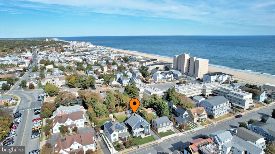 Rare opportunity to purchase  a beach block home on an oversized 53' x 130' lot! Enjoy the extra privacy and take advantage of this huge backyard for outside fun with friends and/or family! If your dream is to sun at the pool in the morning and the beach in the afternoon there is room to add a pool! This 5 bedroom 4.5  bathroom home offers it all with a spacious open concept floor plan, dining area, gas fireplace, newly added powder room, sunporch with easy breeze system, a first floor bedroom along with a full bathroom boasting a tile shower, granite counter tops and linen closet.  The quaint sunroom offers extra space for lounging or game playing-perfect for morning coffee & evening wine sipping.  Gather inside or spill out onto the huge composite deck to soak in the sun, to grill your dinner or to simply relax. The 2nd floor offers 4 more bedrooms, 2 of which have ensuite bathrooms offering privacy to guests and family members. 2 bedrooms with a shared bathroom, laundry area, front facing  deck and a large rear deck accessed through the primary suite rounds out the 2nd level.   Recent major improvements to home include a new roof, new windows, new Hardie Plank lap siding, new Trex composite board decking & vinyl railing on front and rear porch, new HVAC system, new attic insulation, new tankless water heater, new exterior cameras, along with separate meter for irrigation system, an outside shower and encapsulated crawl space.  Don't miss out on the opportunity to live steps away from the beach, boardwalk, fabulous dining , shopping and biking!
This house is being sold fully furnished and has a rental income that ranges from $115,000-168,000/ year. Rentals scheduled for 2025 convey with property.