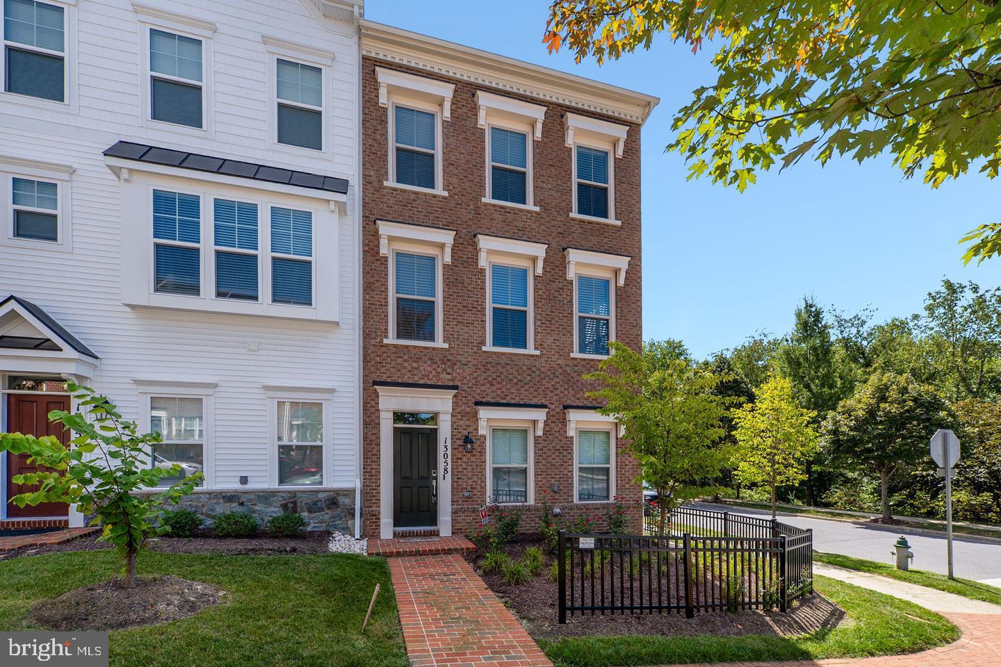 ONLY 2 YEARS OLD!! this 4-bedroom, 3-bath end-unit townhome is perfectly situated in the sought-after Clarksburg Town Center community. Built with modern finishes and luxury vinyl plank flooring THROUGHOUT, this home offers a stylish and functional layout. The entry level features a private bedroom with an ensuite bath—ideal for guests or a home office—along with access to the attached 2-car garage. The second level serves as the heart of the home, boasting a top-of-the-line kitchen with a large center island, breakfast bar, quartz countertops, and gas cooking. The kitchen flows seamlessly into the dining room and a spacious living room that opens directly to the back deck, perfect for entertaining or relaxing outdoors. Upstairs, the top level includes three additional bedrooms, two full baths, and a conveniently located laundry area. The Primary Suite impresses with a generous walk-in closet and a spa-like ensuite bath featuring dual vanities and a luxurious stall shower. Set on a beautifully landscaped corner lot, this home also provides access to an amenity-rich community offering a clubhouse, fitness center, swimming pool, tot-lots, and year-round planned events. Conveniently located near shopping, restaurants, parks, Clarksburg Premium Outlets, and I-270, this home combines comfort, style, and convenience. ** Dogs under 50lbs allowed case by case with additional rent $100 ** We have an in-house Maint Dept for QUICK repair response/ 24 hrs emergency. * AGENTS read the Agent Private remarks in BRIGHT MLS please !!! APPLY on our website under Avail Rental/Apply Now. ALL ADULTS must fill out an APP, you will be asked to upload a paystub and copy of drivers license in the app, so best to have those ready on desktop before applying. App processing take 3 business days +-. ALSO FOR SALE