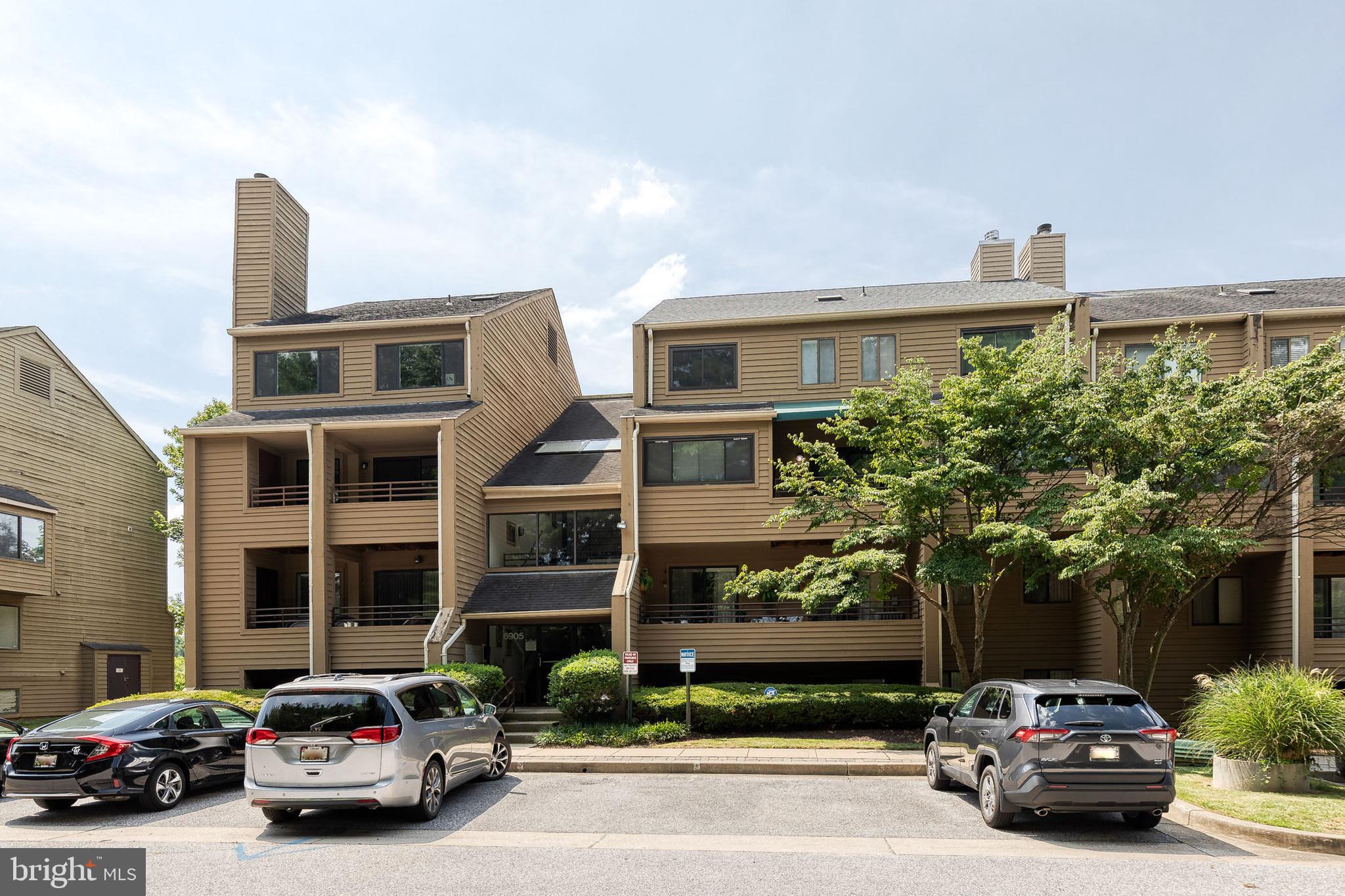 Price adjusted! Welcome to contemporary luxury living in this beautifully renovated penthouse condo, perfectly situated in the vibrant Pikesville/Greenspring area with quick access to I-695 and I-83. Located in a secure, well-maintained building with wide stairwells, moving in is effortless. From the moment you step inside, it’s clear that no detail was overlooked. The expansive main level features an open-concept layout bathed in natural light, thanks to walls of oversized windows. Wide plank luxury vinyl flooring in a soft, neutral tone complements the freshly painted creamy white walls—creating a stylish, modern blank canvas ready for your personal touch. The updated kitchen boasts granite countertops, white shaker cabinetry, stainless steel appliances, and a spacious layout that includes room for a table set. A convenient pass-through with breakfast bar opens to the dining area, making entertaining a breeze. Off the living room, a sunny alcove offers the perfect space for a home office or a lush indoor garden—ideal for plant lovers. Upstairs, the massive primary suite impresses with abundant closet space and a fully renovated en-suite bathroom. The generously sized second bedroom is just down the hall from another beautifully updated full bath. Start your mornings on the private deck with a cup of coffee as you take in the serene surroundings. This exceptional penthouse combines comfort, style, and convenience—truly the ultimate in contemporary condo living.