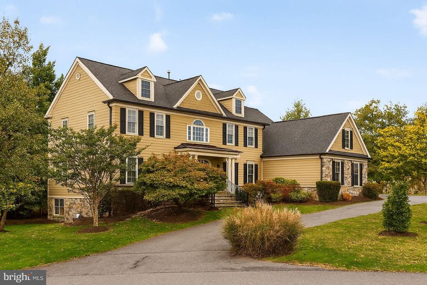 New Roof and gutters! Welcome to 9914 Woodford Rd, Potomac, MD 20854
This show-stopping Potomac gem offers beautifully-appointed spaces with walls and walls of Palladian windows, many updates including new wood floors and fresh paint, and a fantastic gourmet kitchen & breakfast room ideal for comfortable living and entertaining. The upper level is home to 5 large bedrooms and 3 full baths, including those in the fantastic owner’s suite. A sixth bedroom, a bonus room plus so much more living & entertaining areas are in the walkout lower level. Stylishly updated through out the three-level, 7807+ SF home is minutes to the shops & eateries at Potomac Village and a 20- to 30-miutes drive to DC and VA.
MAIN LEVEL
Wide stone steps with wrought-iron railing lead up to a columned portico, where the entry door opens into a spacious two-story foyer with a winding staircase. Sidelights and transom windows, as well as the numerous Palladian windows in the flanking living & dining rooms awash the foyer in natural light, while new hardwood floors here extend throughout the main level. Thick crown molding adorns the living and dining rooms; the latter also has chair rail molding. The windows all have plantation shutters or blinds.
A double-door study sits off a hall to the left of the staircase, and features recessed lights and windows on two walls. A coat closet and a powder room with a marble pedestal sink are right outside the study.
At the center of the home’s rear, the sunken Great Room lives up to its name with soaring ceilings, a bar, a floor-to-ceiling stone fireplace flanked by Palladian windows and French doors that access the wraparound Trex deck. The deck has a gate and steps leading down to the backyard and side motor court with a three-car garage. Adjacent, the new kitchen boasts newly-painted cabinets, thick Quartz countertops, GE stainless-steel appliances and a center island featuring a 5-burner gas cooktop. There’s plenty of eat-in space at the island, as well as in the attached breakfast/ sunroom with windows all around and a French door to the deck. A large walk-in pantry and the laundry room with a utility sink and a broom closet round out the expansive main level. Access to the attached garage is in this area.
UPPER LEVEL
The curved staircase rises up to the top-floor landing overlooking the foyer and great room. Thick carpet lines the hallway and all the 5 bedrooms. Two large bedrooms sit to the right of the stairs, each with three windows and double-door closets. A Jack-and-Jill bath connects the two rooms and features a double vanity and private toilet room with a tub/shower combination. The sumptuous owner’s suite, with over 220 SF, is behind oversized double doors and features a vaulted ceiling with recessed lights & an overhead fan, a gas fireplace flanked by windows. A short hall contains huge his & hers walk-in closets and a pair of windows offering natural light, ending at the spa-like, all-white owner’s bath. Here, relax in a stand-alone soaking tub under windows, or enjoy a rain shower in the glass-enclosed stall with built-in bench! His/hers vanities and a private toilet room are part of the en-suite bath. On the other side of the stairs, bedrooms 4 & 5 are connected by a bath with two vanities and a tub/shower combo. One of these bedrooms is a loft with a vaulted ceiling, a lighted ceiling fan and a double window nook – ideal for a study or planning desk. A crawlspace closet and a walk-in closet are also featured in this loft bedroom. A hall linen closet completes this level.
LOWER LEVEL
The carpeted basement offers a spacious, open rec room with a window and French door to the yard; an in-law or nanny suite complete with a full window, walk-in closet and a private bath; and a large bonus room with recessed lights (this room can be a home theater, a hobby room, a gym…) A second half-bath, additional storage closets and the utility room round out this level.