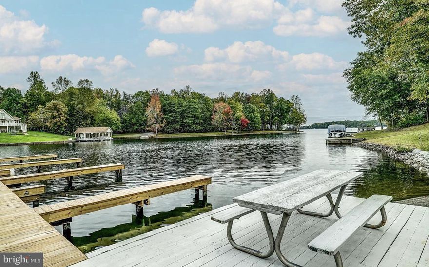 Bring your lake house dreams, your boat, and your family to Lot 11 in the Clear Water subdivision, located in a peaceful cove on the private side of Lake Anna! Just a short walk to your very own boat slip, this one acre lot is private, level, and ready to make your dreams come true. The common area (where your boat slip is located) also offers a boat ramp, a covered picnic area, relaxing seating and a beach! What's more, the location is ideal: very close to restaurants, groceries, The Lake Anna Taphouse, vet clinic,  ABC, nail spa, and more!