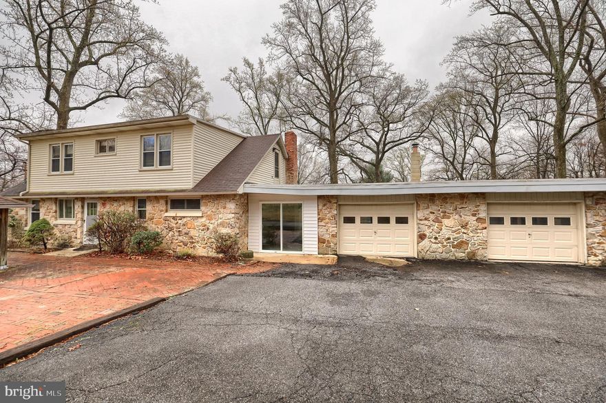 Nestled on a picturesque, tree-lined 1.6-acre lot, this 5-bedroom, 2-bathroom home offers immense potential for the right buyer. Located in the highly sought-after Cumberland Valley School District, this property is perfect for investors or those looking to make a home their own. The spacious interior includes a large, finished walk-out basement, providing additional living space or recreational opportunities. With a 2-car garage, you'll have plenty of room for storage and parking. While the home does require some attention and updates, it offers an excellent opportunity to create the ideal space in a prime location. This property combines the best of both privacy and convenience, making it an ideal canvas for your next project. Don't miss your chance to invest in this hidden gem!