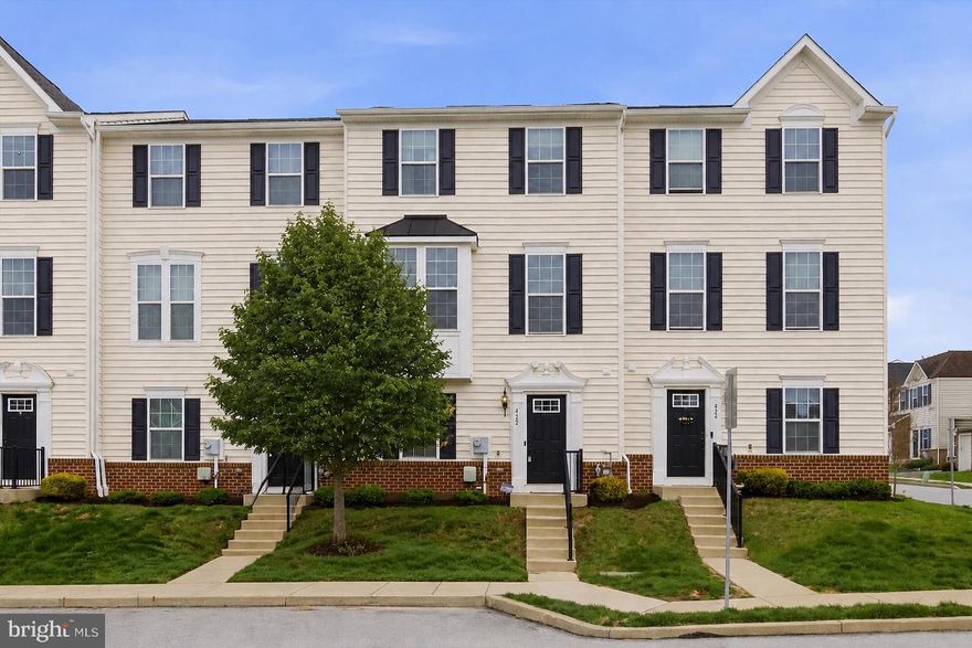 Welcome to 422 Lopata Rd, a beautifully maintained 3-bedroom, 2.5-bath townhome that perfectly combines comfort, style, and modern convenience.

Step inside to a versatile lower level featuring a convenient half bath and flexible living space ideal for a home office, recreation room, gym, or additional storage. This level also offers direct access to the attached 2-car garage for added ease and functionality.

Upstairs, the bright and open main living area is thoughtfully designed for both everyday living and entertaining. The spacious living and dining areas flow seamlessly into the modern kitchen, with easy access to a private deck — the perfect spot to relax or host guests.

The upper level boasts a generously sized primary suite complete with a private full bath, along with two additional bedrooms and another full bathroom. A conveniently located upstairs laundry area adds to the home’s practical and efficient layout.

Thoughtful updates throughout the home include a new dishwasher (2025), updated carpeting, and fresh paint in select areas. Enjoy modern smart-home features such as a Nest thermostat, security system, WiFi-enabled garage door opener, built-in speakers, and Ethernet wiring on every floor.

Located in a desirable neighborhood close to schools, parks, shopping, and everyday conveniences, this move-in ready home offers the perfect blend of space, functionality, and modern living.