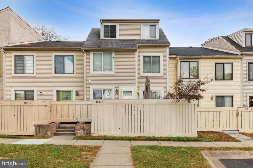 Welcome to your new home! This charming townhome invites you in with a sunny front patio, enclosed by a privacy fence, creating a warm and welcoming atmosphere. As you enter the main portal, you'll be greeted by a light-filled entrance area, a spacious living room adorned with recessed lighting, a modern decorative fireplace, and stunning wall-to-wall hardwood floors, accompanied by a convenient half bathroom. The eat-in kitchen boasts modern amenities, including a new stainless-steel refrigerator, 42-inch cabinets, and granite countertops. The separate dining area is perfect for hosting intimate gatherings. Upstairs, the beautiful townhome offers three generously sized bedrooms, with one occupying the entire top floor, complemented by two updated full bathrooms. This well-maintained home provides a fantastic opportunity for homeownership. The fully finished basement adds versatility, offering additional space for a potential fourth bedroom, office, theater room, entertainment area, or gym, complete with a convenient laundry room. Step outside to enjoy the community's amenities, including pools and playgrounds. Conveniently located within walking distance of shopping, this home offers easy access to bus stops, major highways like I-270, and public transportation: Marc/Metro stations.  Rest assured; this home offers the new owner peace of mind for the foreseeable future.  You won’t be disappointed!