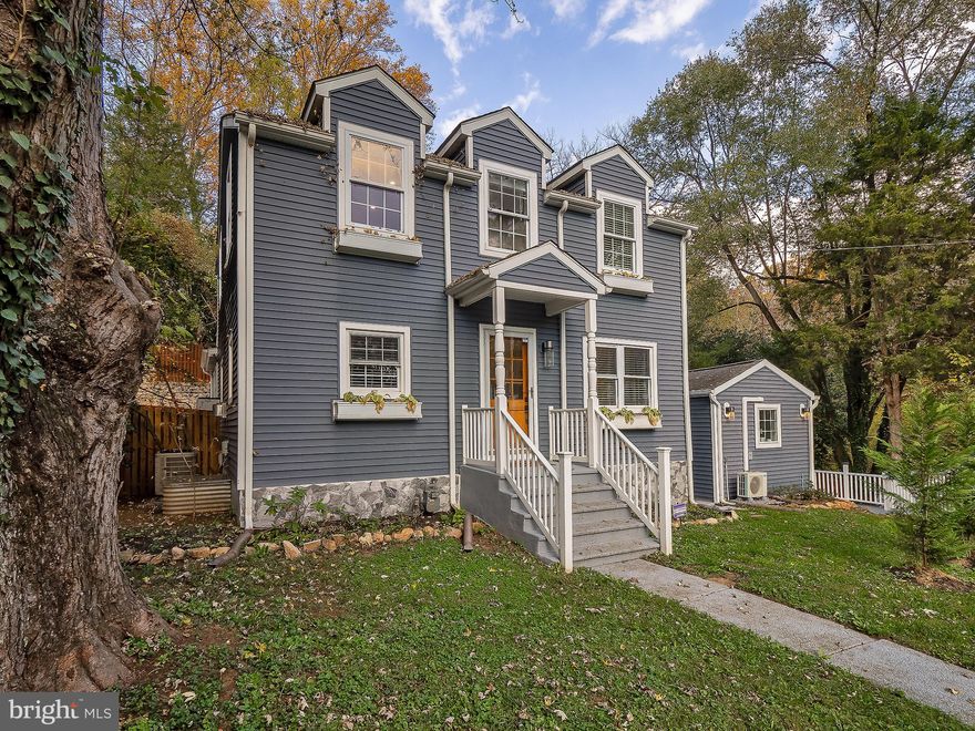 Nestled in the coveted Garrett Park Neighborhood, this home is nothing short of breathtaking. The ultimate combination of modern excellence and urban convenience. From the elegant facade to the dramatic entrance, this home exudes the finest comfort and style with first-class amenities. Designed by Award Winning MP Designs for simple living, grand space and entertaining.

Enter to discover a spacious open layout defined by large windows surveying an endless Rock Creek Park view.  The inviting heart of this home is the eye-catching kitchen, inspired by the Ivy Lodge of Southhampton NY - with a marble-topped island and kitchen table, new hardware, white custom cabinetry, and premium stainless-steel appliances. The WOW is the custom-milled 7 step crown molding.  
 Five bedrooms feature ample closet space. The four bathrooms are pure contemporary splendor with glass walk-in showers and floating vanities. This exquisitely designed residence is of unparalleled quality and boasts a natural flow to the outdoor space featuring built-in barbecue areas adjoining a bar area and cozy outdoor fire pits, all overlooking a park setting. The highly unique private studio is one-of-a-kind beauty where the space meets the zen.. Lighting fast internet installed with perimeter surveillance. 

If you love the great outdoors and want to catch glimpses of nature all around you - there are 1,800 acres in Rock Creek Regional Park including the beautiful 75-acre Lake Needwood Park. Awesome dining and shopping less than a half mile away at "Pike and Rose".  

Perfectly close to Washington D.C., supermarkets, shopping, and entertainment! See It, Love It, Covet the Lifestyle!   Pictures say it all.