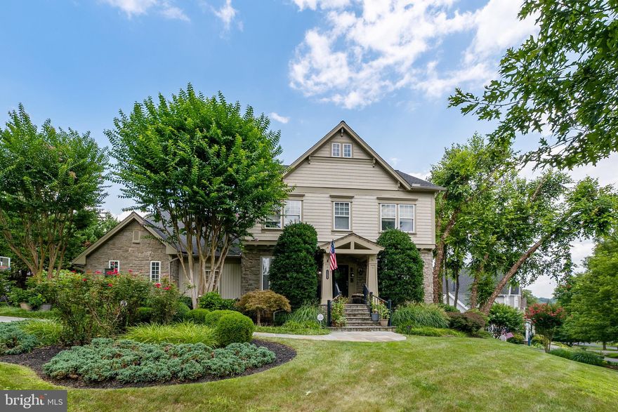 Welcome to 12604 Running Brook Drive—an exceptional former model home offering six bedrooms, four full baths, and a true resort-style living experience in the heart of Clarksburg. Perfectly positioned on a beautifully landscaped corner lot, this stunning residence has been thoughtfully updated with custom, modern fixtures and finishes throughout, creating a seamless blend of elegance and comfort.

Step inside to find fresh paint, new carpeting, and stylish LVP flooring that set the tone for the expansive, light-filled floor plan. The main level features a rare entry-level bedroom and full bath, ideal for guests or multigenerational living. At the heart of the home is a gourmet eat-in kitchen boasting granite countertops and a brand-new gas cooktop, opening effortlessly to a cozy family room—perfect for everyday living and entertaining alike. A private home office provides a quiet and functional workspace.

The upper level offers four generously sized bedrooms, two full baths, and a spacious bonus room ideal for a playroom, media space, or second family room. The primary suite is a true retreat, showcasing a custom feature wall, a sitting area, an oversized walk-in closet, and a beautifully updated ensuite bath with a soaking tub and separate stall shower.

The fully finished lower level extends the living space with a recreation room, bar area, additional bedroom, full bath, and ample storage.

Step outside to a backyard that feels like your own private oasis. Designed for unforgettable gatherings and everyday enjoyment, the outdoor space features a deck, sparkling pool with expansive pool deck, bar area, grill station, retaining walls, newly landscaped beds, pathways leading to the driveway, and striking illuminated columns that create a resort-like ambiance day and night.

This one-of-a-kind home delivers space, style, and a vacation feel—every single day.