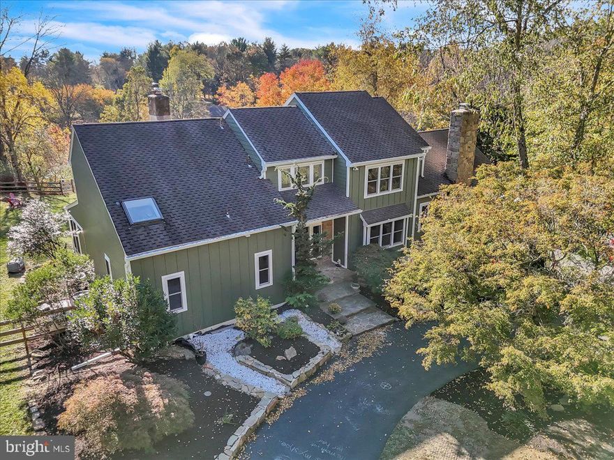 A rare opportunity awaits with this one-of-a-kind, show-stopping home that masterfully blends luxury and privacy on over 2 meticulously landscaped acres with views that are simply unparalleled! Overlooking two picturesque ponds, 116 Harvey Ln is designed to amaze with its setting, extraordinary features, and high-end upgrades throughout. Pride of ownership shines in every detail of this heavily updated property. As you approach, you’ll be captivated by the all-new LP Smartside siding, new windows, 50-year shingle roof, and custom landscaping that frame this stunning home. Out back, you’ll find a custom-designed saltwater pool and spa complete with two Baidu swim jets, an expansive sun shelf, and an automated cover for convenience. Relax on the multi-level, 500 sq. ft. synthetic deck that overlooks the pool and ponds, enjoying what may be the best views in Delaware County! Inside, the attention to detail is remarkable, offering a perfect layout for entertaining. The main level features wide plank engineered hardwood floors and large windows that capture breathtaking views from every angle. The custom kitchen is a chef’s dream, boasting new, high-end cabinetry, countertops, and upscale appliances, along with a hidden pantry that will quickly become a favorite feature. The primary suite on this level opens to a sunroom overlooking the stunning rear landscape and includes an en-suite bath with a soaking tub, walk-in shower with custom tile, double-sink vanity, and walk-in closet. This floor also includes a formal dining room with a stone-front fireplace, a spacious family room with vaulted ceilings, breakfast nook, main-floor laundry/mudroom, a half bath, and skylights throughout. The second floor offers a second primary suite with an en-suite bathroom, vaulted ceilings, skylights, and a walk-in closet, along with two additional well-appointed bedrooms and an upgraded full hall bath. The finished basement features a walk-out to the backyard, a half bath, and ample space for storage, workshop, and utility needs, along with inside access to the attached 2-car garage. All of this in the award winning Unionville- Chadds Ford School District! A home of this caliber doesn’t come on the market often—don’t miss this unique chance to own a piece of paradise. Schedule your private tour today!