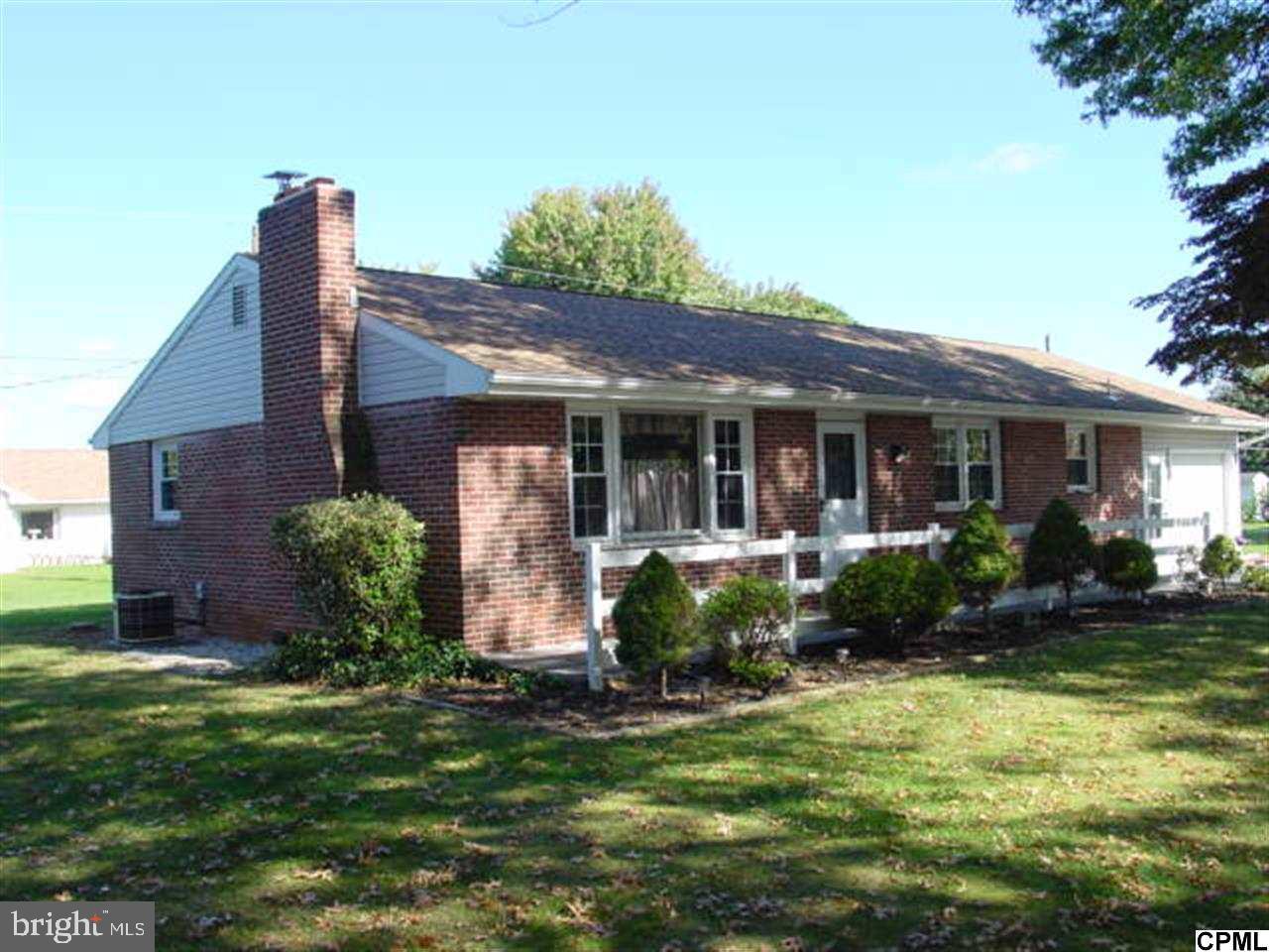 Brick ranch 3 BR 1 BA home resting on double lot on quiet street. Hardwood floors everywhere except bath and kitchen downstairs. Basement with exterior access with all brick finished area with fireplace. Needs finishing touches. Entire lot for your personal use or may sell other half for extra income possible. Current list price does not include additional lot and settlement of home is subject to settlement of separate lot.