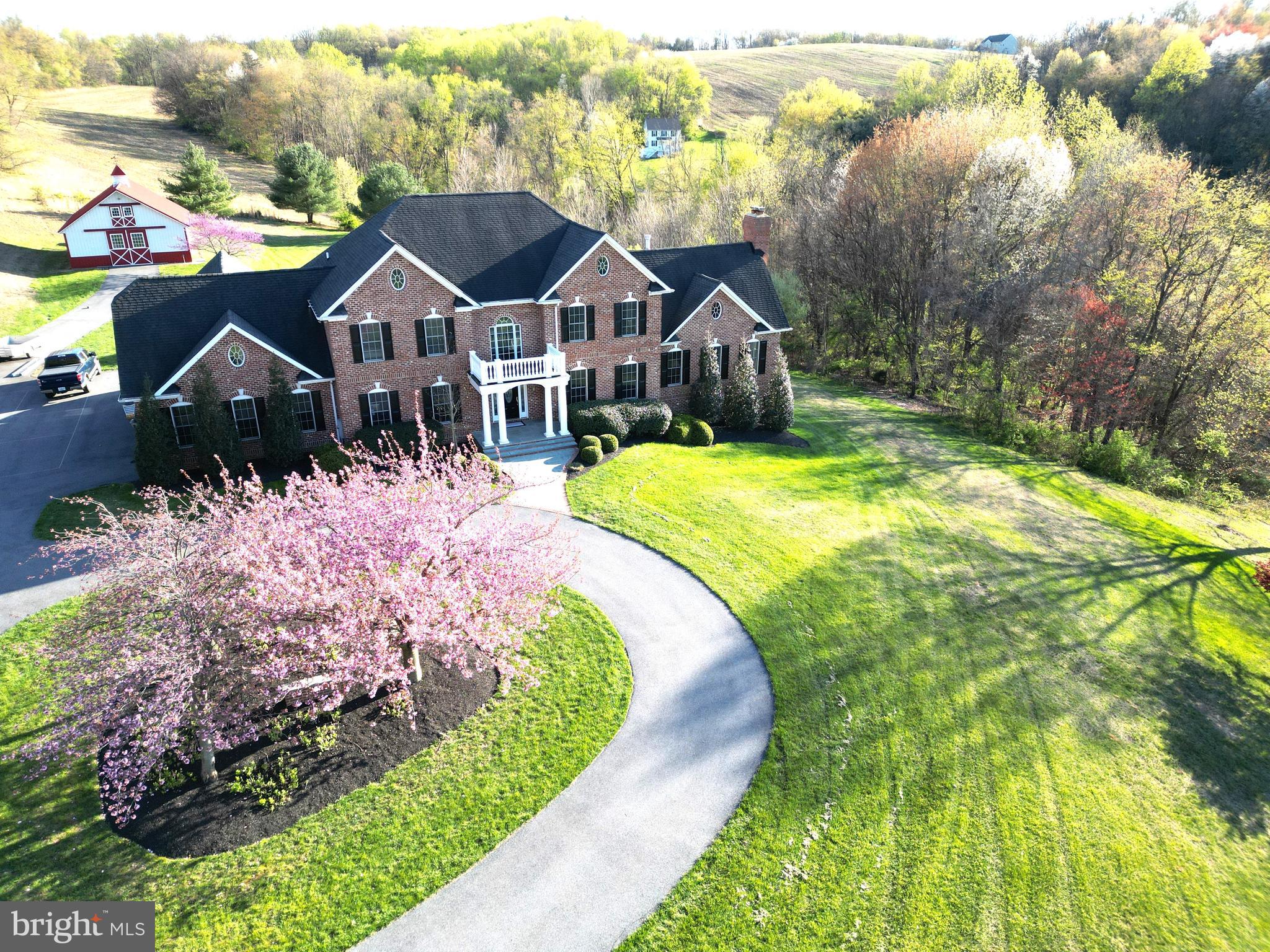 This property is amazing!! The home has Luxurious features throughout. The moment you walk through the front door the gorgeous staircase in the expansive foyer area is what first catches your eyes, flanked by a professional office and formal dining room. As you pass through you enter the large kitchen area that's complemented by rich colored cabinetry, new Silestone quartz countertops, a large island area, new 5-burner propane cooktop, all of which make food prep for large gatherings more enjoyable. This area also has a large informal eating area and is open to the sunroom and great room. The great room offers a cathedral ceiling, floor to ceiling stone fireplace, and plenty of natural light with oversized windows...and an incredible of view of the large pond. The sunroom room area offers panoramic views of the farmed fields, woodland areas and the incredible outside recreational area highlighted by the large saltwater pool. The screened rear porch is accessed from the sunroom and quite frankly, you may never want to leave this spectacular space!! The upper (bedroom) level offers a magnificent master bedroom suite and equally impressive master bath, three large secondary bedrooms and a full in-law/guest suite with a private entrance. The lower level is set up as a recreational space and includes a wood burning fireplace, bar area, workout/hobby room and a huge activity area. There is plenty of storage for vehicles, equipment, or motorized toys, in the oversized attached 3-car garage or in the detached pole barn. Moving on to my favorite part of this property is the 93 acres of rolling fields/woods, AND a large (approx. 1-acre) fully stocked pond. This offers outdoor recreation opportunities that is an outdoorsman's dream place! Last, but not least, the homestead has been converted into a 3-unit invest property that will provide additional income along with the 50-acres of tillable ground that's being leased to a farmer. The combined projected gross rent is $41,000 annually. This property is a permanent protected paradise subject to a Rural Legacy Easement. Please check out the pictures and virtual tour of this incredible property!