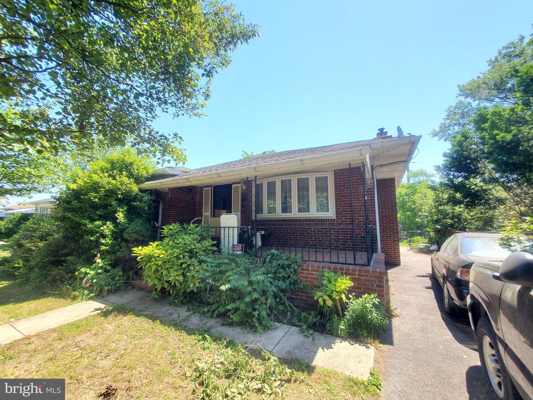 Great bones on a great street. This ranch style home is in need of a fresh look and overhaul. This home can be main level living at it's best. 2 Bedroom 1 bath home that could be converted to a 3 bedroom via the separate dining room. Good size rear yard and paved parking. with 2 sheds in rear. Basement has rear exit for access and has already been gutted. Home is being sold as-is, where is and buyer to verify all utilities. Property is need of complete renovation.