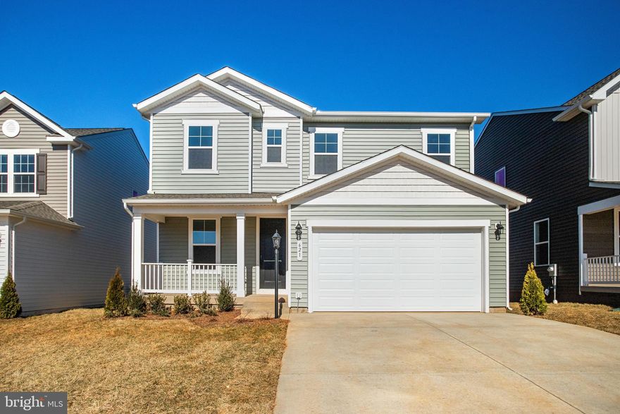 ASK ABOUT SPECIAL FINANCING! $0 down payment USDA financing eligible! This Lapis by Richmond American will be move-in ready in January!!  There's a lot to love about the Lapis floor plan! The charming front porch leads to an inviting, open layout. Walking through the front door to the left is a adaptable flex room and open oak stairs and beyond that is the main living space. The kitchen with a center island and large walk-in pantry flows into a dining room and a great room, completed by a center-meet sliding door – leading to your 29x10 covered Deck. Upstairs, the primary suite offers a full private bath and a generously sized walk-in closet. Adjacent are two additional bedrooms, each with their own walk-in closets and a convenient loft for extra living space. Curated finishes round out this home such as Blanco Maple quartz countertops, Aristokraft White cabinets, 7” Kenwood LVP floors on the main level, and sleek matte black light and plumbing fixtures. Welcome to Round Hill Meadows in Orange! Residents will appreciate the small-town charm as well as the conveniences of being close to routes 15, 522 and 3, award-winning wineries, Lake Anna State Park, Lake Orange and the Rapidan River nearby for fishing, swimming, kayaking and boating! Model is OPEN but visitors are encouraged to call ahead to be guaranteed a dedicated appointment.