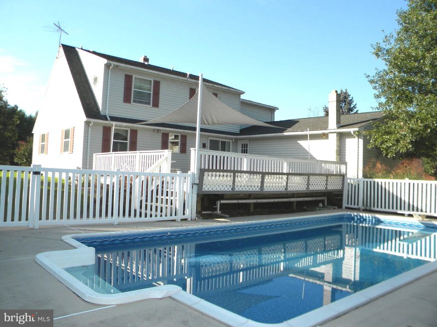 A charming Colonial on Almost 6 private acres nestled down a tree lined drive in Hereford School Zone. Balto County Blue Ribbon School.(HZ). Add a 44x30 Outbuilding for Crafts   WoodWorking   Entertaining or Contractors Shop + a 30x26 storage bldg makes it a perfect HomeStead. X tra large FR, Main Level Bdrm/Office, Master Bedroom Suite, 3 Upper Bdrms. An In-Ground Pool completes your needs. A setting for the nature lover just add a couple chickens and goats. Located in one of MDs most desirable school districts.