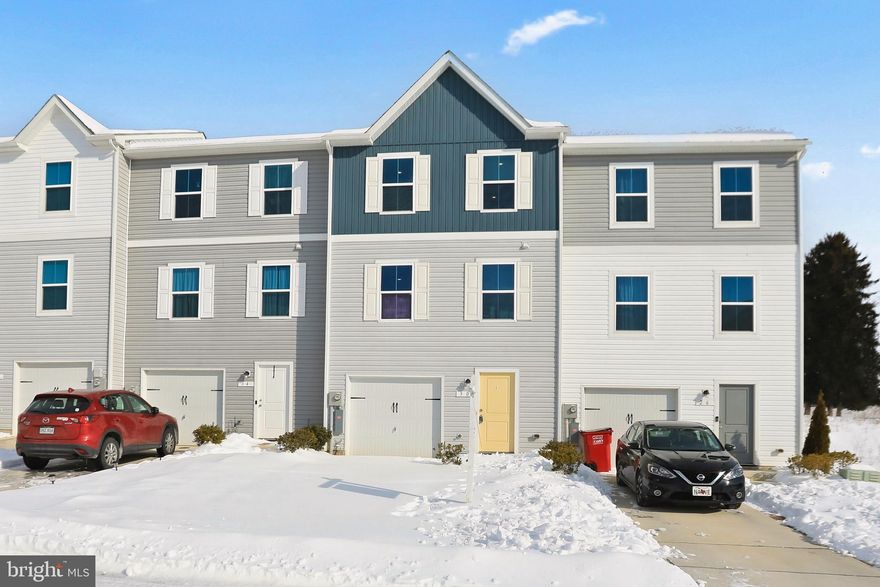 Welcome to 30 Scoter Road, a beautifully maintained 3‑bedroom, 2.5‑bath townhome in the sought‑after Aspire at Dillon Farm community. Built in 2023 and offering 2,280 square feet of finished living space across three finished levels, this modern home blends comfort, style, and convenience in an ideal Hedgesville location.

The main level features a bright, open layout with generous living and dining areas, perfect for everyday living and entertaining. The modern kitchen includes a center island, ample cabinetry, and excellent prep space.

Upstairs, the spacious primary suite offers a walk‑in closet and private bath, accompanied by two additional bedrooms and a full hall bath.

The lower level is fully finished and includes a spacious rec room, laundry area, and walkout access to the backyard—adding functional space for a home office, gym, media room, or playroom, with flexibility to fit your needs.

Located just minutes from Martinsburg and the WVU Medicine Berkeley Medical Center, Dillon Farm is also convenient to downtown Hedgesville, local parks, and everyday essentials like shopping, dining, and grocery options along Route 9. Enjoy easy weekend access to hiking and kayaking at Sleepy Creek Wildlife Management Area, scenic day trips to Harpers Ferry and Cacapon Resort State Park, and local wineries and farm markets throughout Berkeley County. For commuters, the neighborhood offers quick access to Route 9 and I‑81, with MARC train service available in nearby Martinsburg for direct routes into Maryland and the D.C. Metro area.