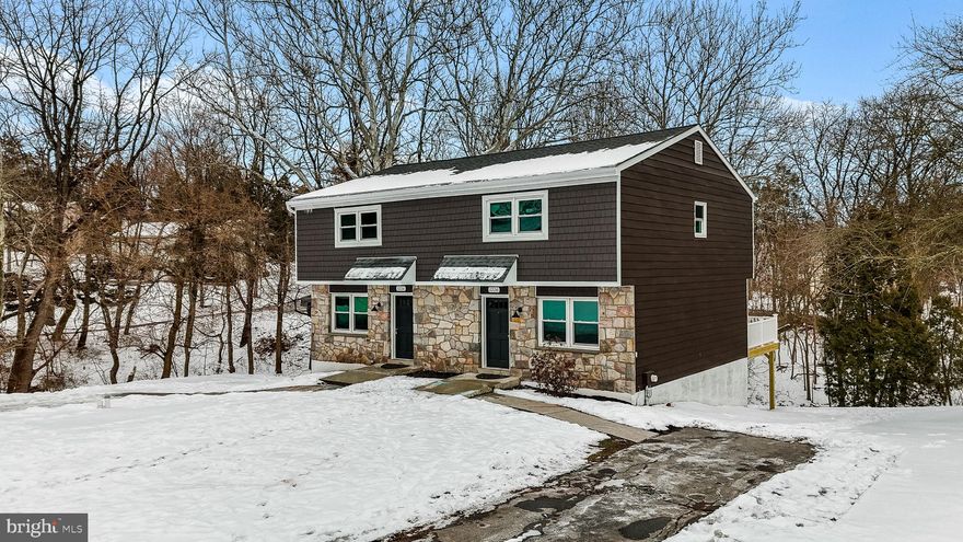 Beautifully renovated twin home in Pottsgrove Schools overlooking the creek and wooded area.  Brand new covered front porch and cedar shake impression siding give this home some character and cover when your guests come to visit.  All new Luxury Vinyl flooring throughout the first level , open concept kitchen and dining area with new patio door to a brand new deck expands your living space to the outdoors.  Kitchen has been completely redone by opening up a wall and installing new shaker style cabinets with gorgeous granite countertops and stainless steel appliances.  Recessed lighting throughout the kitchen and dining areas make this space bright and cheery.   Full finished basement recessed lighting, luxury vinyl flooring , a laundry area and a door to the rear yard area is the perfect place to relax and watch movies or sports.  Upstairs are 3 nice sized bedrooms and a fully renovated bathroom with brand new large vanity, tub/shower and linen closet for extra storage.  Brand new roof and state of the art ducted split HVAC units.   Dual zone heating and air conditioning keep the home comfortable all year round.  Move right in and start enjoying this beautiful home !  Call today for your showing