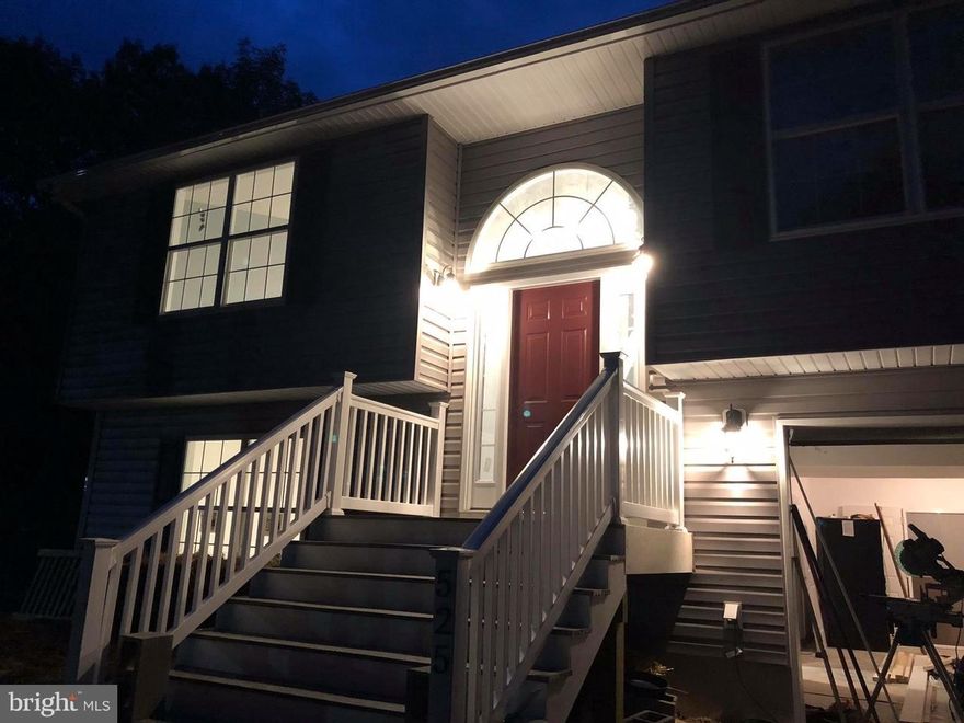 Photos similar under construction- 3 BR 3 full bath 1800 finished sq ft, huge 24 x28  2 car garage on wooded lot, PAVED DRIVEWAY! LED Energy Efficient lighting - nickel finish. Open floor plan, vaulted ceilings. Kitchen Cabinets upgraded with crown molding and island, 3-full baths with higher backsaver height vanities & drawers in each double bowl pewter vanity tops. Still time to pick colors!