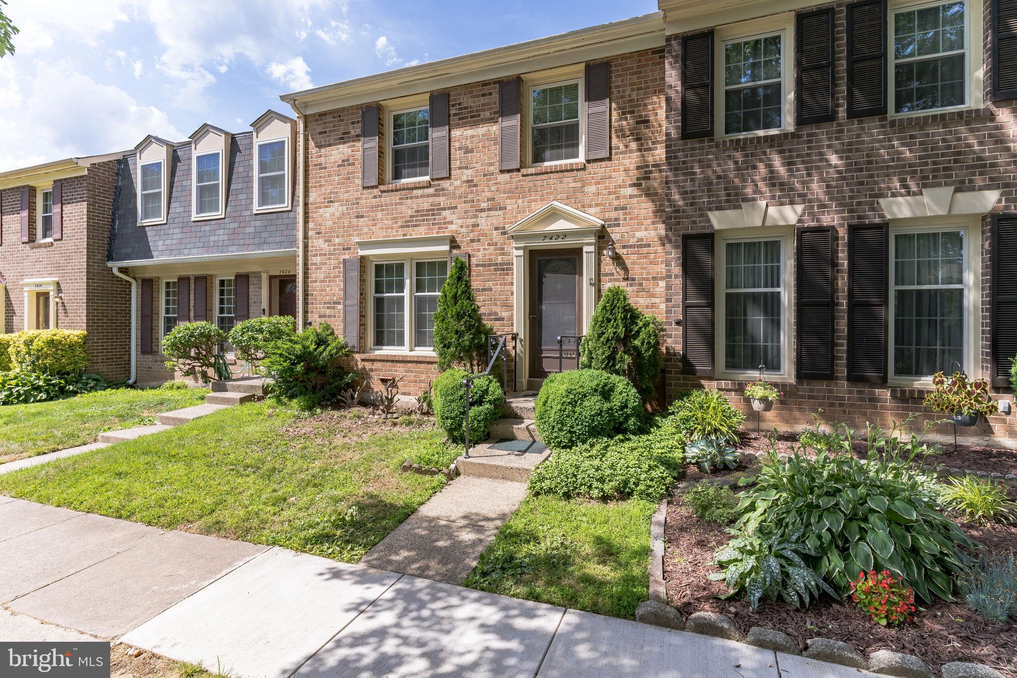 All brick beautiful 3BR 3.5 BA townhouse. AC(2022), water heater(2022), granite countertops, hardwood floors on main level and upper level. ceiling fans, large MBR shower with seating. Full walk-out basement includes huge family room w. glass-door fireplace, full bath, large utility room, brick patio. Close to everything! Parking space #89