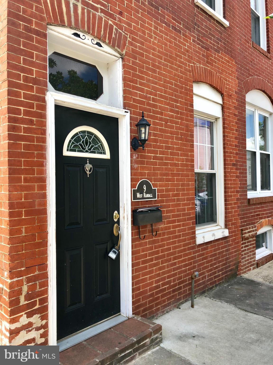 This well-maintained two-bedroom, two-bathroom home offers a thoughtfully designed interior with a blend of classic character and modern functionality. The main living space showcases rich wood flooring, an exposed brick accent wall, and neutral tones that complement the generous natural light filtering in through the windows. A ceiling fan adds comfort to the airy layout, making it a welcoming space to relax or entertain.
The kitchen is equipped with built-in cabinets and drawers that provide ample storage. It also features a refrigerator, stove with oven, microwave, and dishwasher. The tiled flooring enhances both practicality and style, while a window invites daylight into the space, giving it a warm and functional atmosphere.
Both bedrooms feature wall-to-wall carpeting, neutral colors, and plenty of natural light from multiple windows. The second bedroom includes a ceiling fan for added climate control. The two full bathrooms are well-appointed, one featuring a shower enclosure and the other offering a soaking tub—both finished with tiled flooring, lavatories, vanity mirrors, and windows.
Additional conveniences include a parking pad at the rear of the property, online tenant portal access, and 24-hour emergency maintenance services. Small pets are welcome.
This home is situated in a highly walkable neighborhood with a strong community feel and is within convenient reach of key city destinations.
Local Attractions and Nearby Access Points:
Federal Hill Park – 5 minutes by car
Inner Harbor – 7 minutes by car
Cross Street Market – 4 minutes by car
Riverside Park – 5 minutes by car
M&T Bank Stadium – 6 minutes by car
Nearby Highways:
I-95 – Approximately 7 minutes away
I-395 – Approximately 6 minutes away
Small pets accepted (with $500 non-refundable pet fee and monthly pet rent).
Agency disclosed upon initial contact. Agent conducts showings; BMG manages follow-up, paperwork, move-in post-approval. Vouchers work with BMG directly.