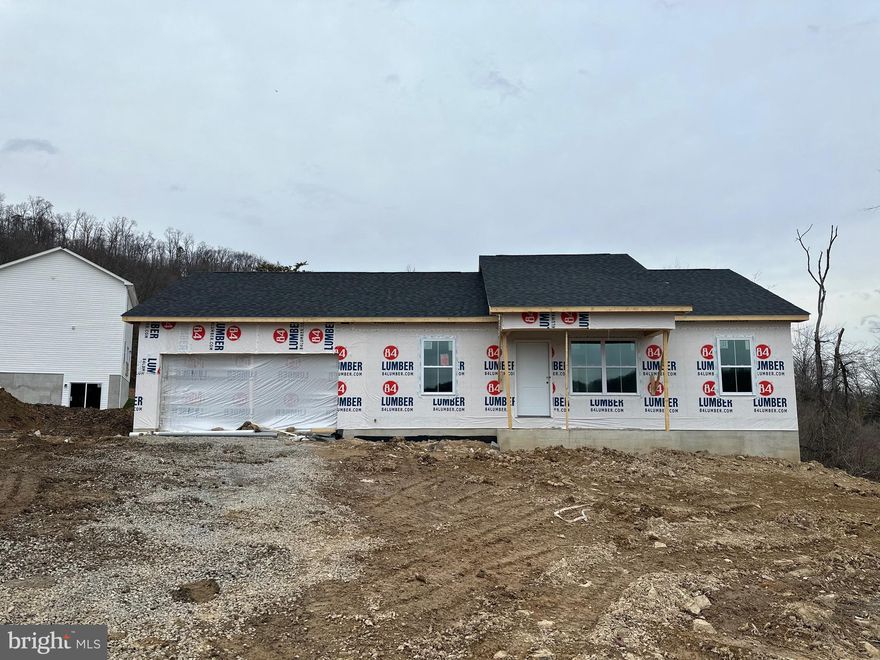 3 bedroom, 2 full bath ranch home.  Selections for  flooring colors can be selected on this home. Stainless Steel kitchen appliances consisting of Refrigerator, Electric Range, Dishwasher & Microwave are included.  Granite counter tops are standard with this model along with other nice standard features.  Paved driveways for each home. No construction loans are needed. The builder will finance the build and deliver you a quality finished product with one settlement. Your lender letter and deposit is all it takes to move forward. Photos are similar construction. Minutes from Cacapon State Park and downtown Berkeley Springs.