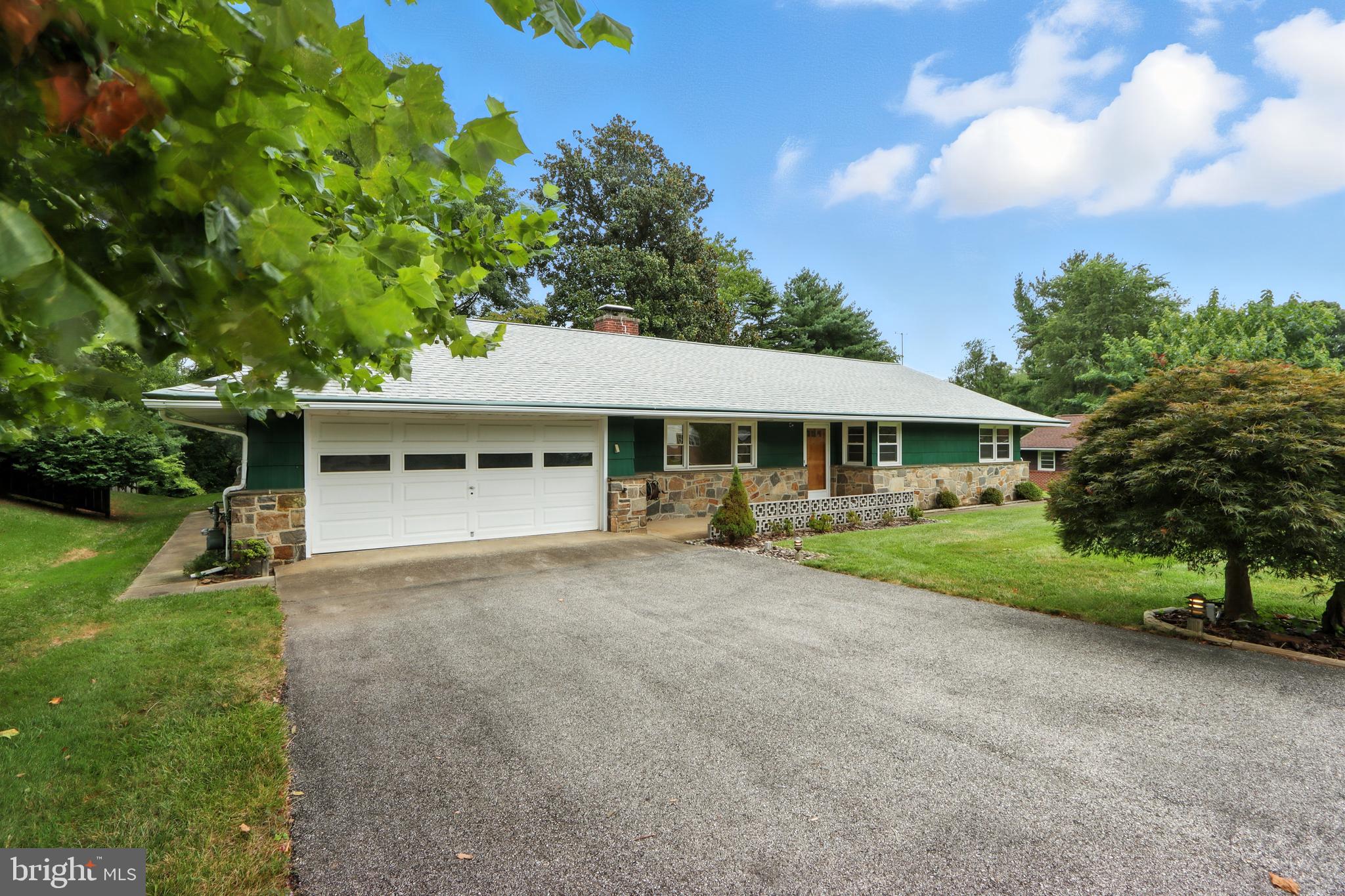 WOW!! don't miss this great rancher in sought after Knollview. This wonderful home has been meticulously maintained. Outside there is an irrigation system for the front and back yard, a screened in covered porch with a slate floor and views of the rolling back yard backing to UMBC. Inside this great home has parkay floors throughout the home, the kitchen and baths are retro, and a the home was just freshened up with new paint. There is an abundance of room in the garage. Don't miss seeing this great home yourself.