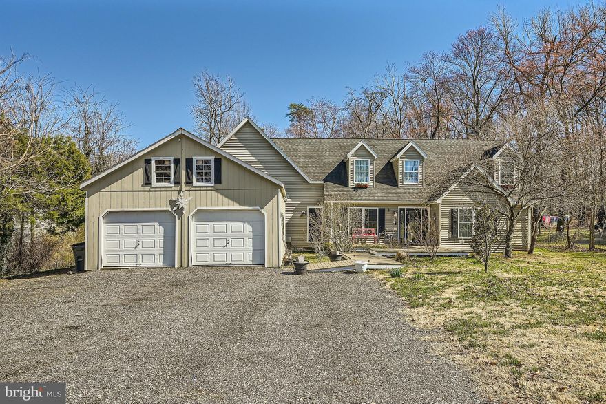 Multi-Generational home, ready for large family. Luxury Vinyl Tile throughout the home and all bathrooms are tiled.  Five bedrooms, five and a half baths including 3 owners suites.  Main floor suite is 15 x 19 with 2 walk in closets and a 20 x 10 full bathroom with doors leading to back deck.

  Main floor also features formal living room, family room,  dining room with gas fireplace, laundry room and office.  The oversized kitchen features an eight foot island, custom wood cabinetry with roll out shelves, a walk in pantry and 36" pantry cabinet and separate eating area.

   Second first floor suite measures 15 x 14 with a wall to wall closet and dedicated full bathroom.  Remaining two first floor bedrooms are separated by a jack and Jill bathroom.  Home is setup for second laundry room on upper level.

  Stairway leads up to a gym and 34 x 17 great room with 17 foot ceilings and shiplapped walls and another full bathroom with storage area.  Large bar area features refrigerator, sink, custom cabinets.

  Finally on the upper level is a 16 x 16 owners suite with 10' ceilings,  a 21' closet, an 11 x 10 walk in closet as well as a large bathroom with soak in tub and separate shower.
  Lot is 1.12 acres and is zoned R2.  Lot may be subdividable, but definately no HoA.