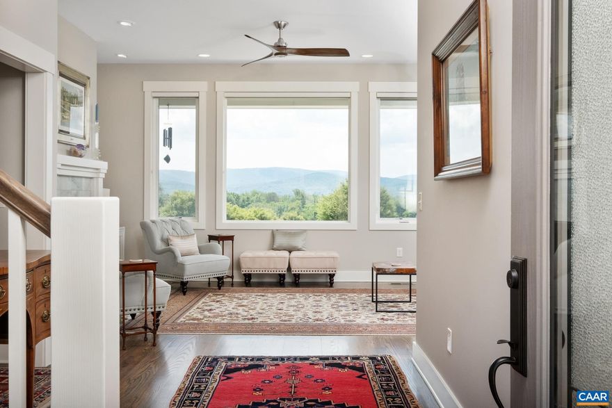 Welcome to one of the best views in Waynesboro. This well-appointed four-bedroom, three-full-bath home offers a thoughtful blend of comfort and functionality in a desirable setting. Situated to capture uninterrupted views of the Blue Ridge Mountains, the property provides a peaceful backdrop for everyday living.  Inside, the open floor plan features a spacious great room that connects seamlessly to the kitchen, complete with ample counter space, quality finishes, and custom cabinetry. The main-level primary suite includes a private bath designed for convenience and relaxation. Three additional bedrooms and two full baths provide flexibility for family, guests, or a home office.  Outdoor living is equally inviting with a motorized pergola and mature landscaping that complement the mountain views. Whether enjoying morning coffee or hosting gatherings, the setting is ideal for taking in the natural surroundings. Certified Pearl Platinum Home,,Granite Counter,Wood Cabinets,Fireplace in Living Room