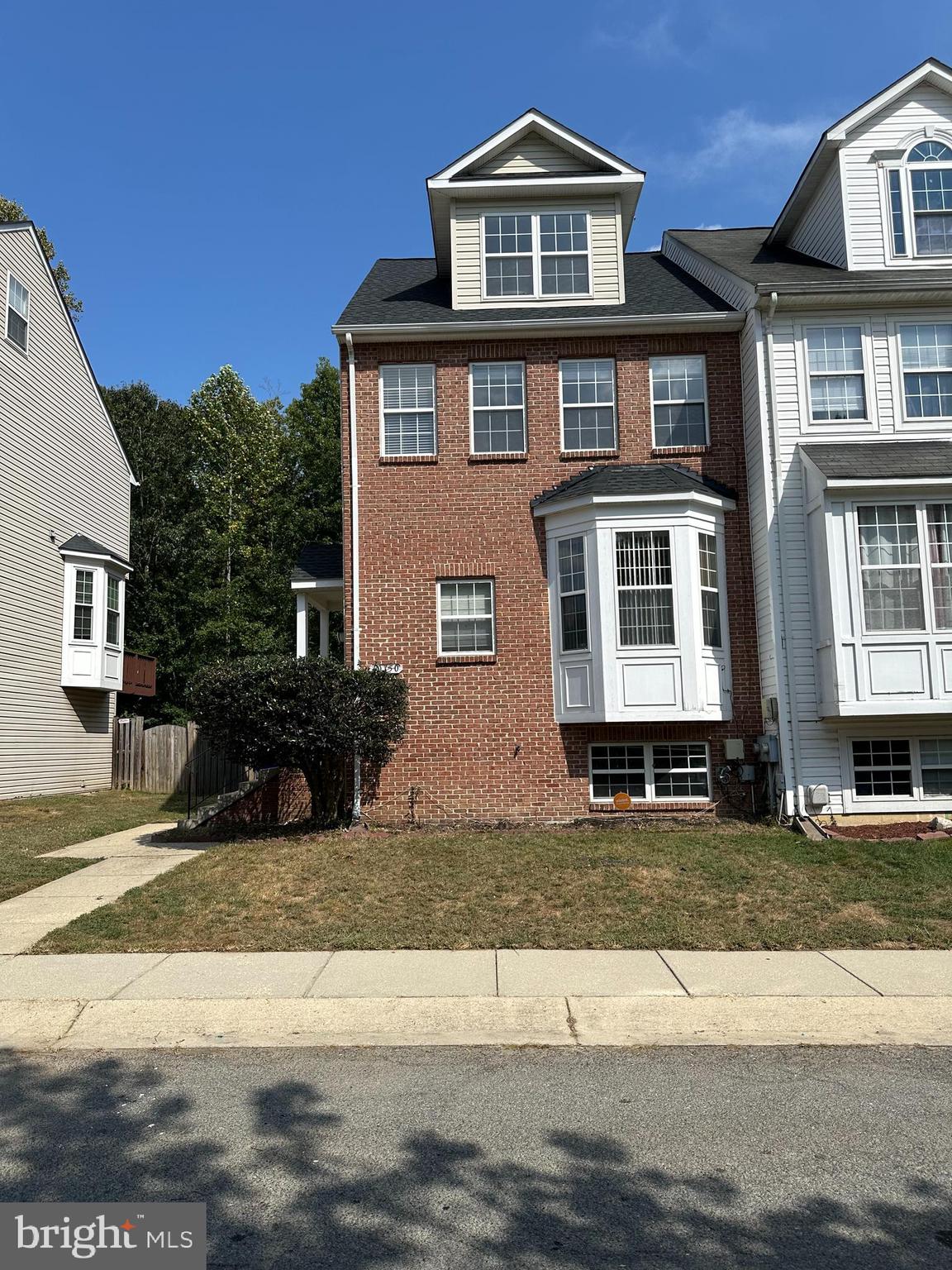 priced to sell!*gorgeous 4 level end unit townhome features 4Br/3.5Ba*stainless steel appliances*eat-in kitchen* hardwood floors in liv/din room*gas fireplace*2nd level has two bedrooms w/walk-in closets/full bath/laundry room*3rd level has huge owner's suite w/luxury bath/jacuzzi tub/separate shower/walk-in closet/hardwood floors*lower level has one bedroom/full bath/open area for entertainment/lots of storage space*fenced in backyard*two assigned parking spaces*5 min to St. Charles Mall*2 min to route 301*buyers should be preapproved*no home sale contingencies*30 days or less closing*text L/A with questions