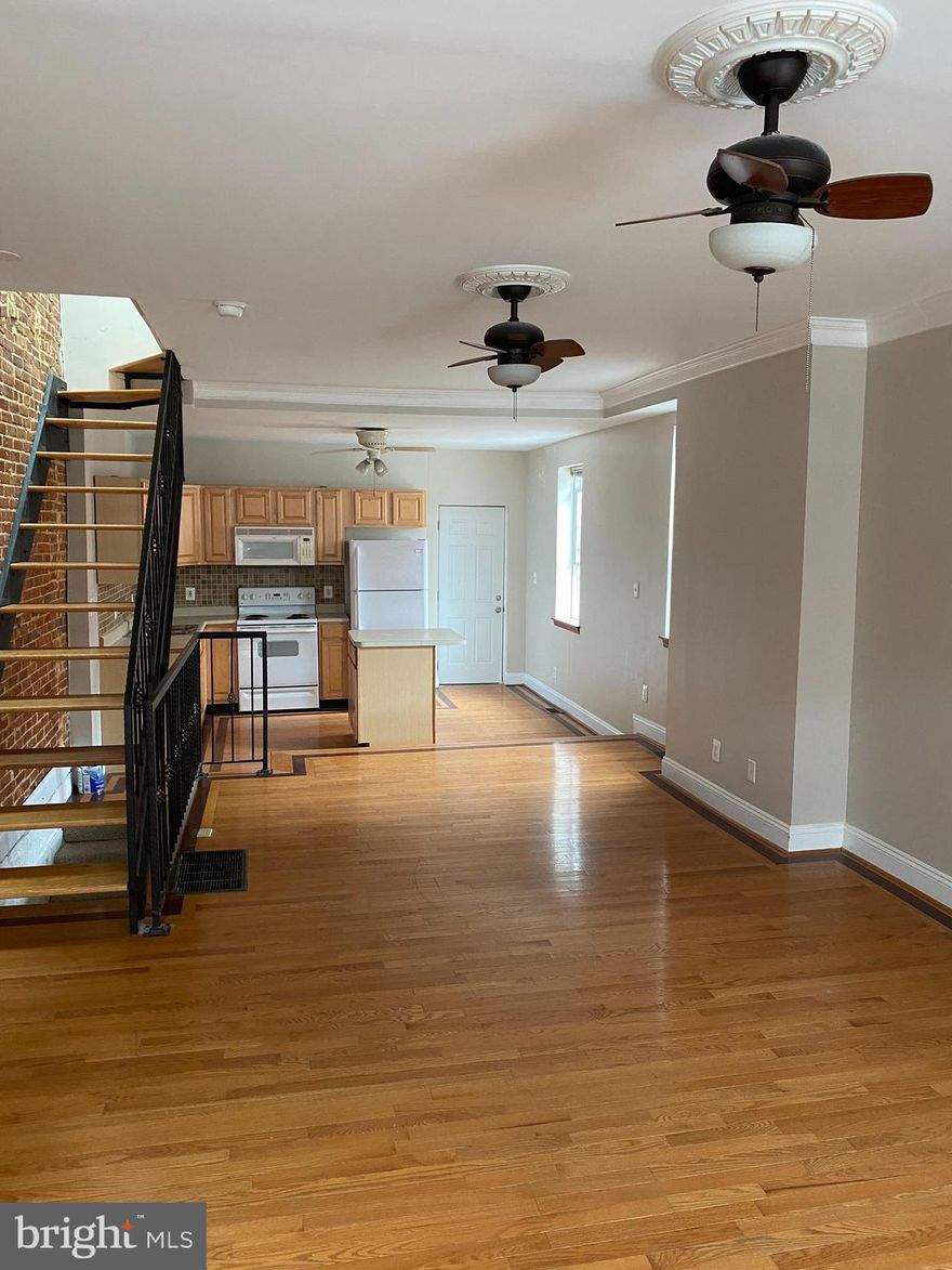 **Off Street Parking**   2 bed 2 bath.  Hardwood floors.  Wide open 1st floor.  So close to UM Baltimore, Ravens and Orioles Stadium,  10 minute walk to the Inner Harbor,  This place has it all!