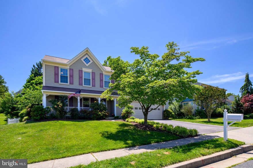 Experience the charm of this spacious, well-maintained Colonial home in Northwind Farms, featuring 4 bedrooms, 2 full and 2 half baths, and a 2-car attached garage. Conveniently located near shopping, dining, and top-rated schools, this home offers easy access to everything you need.

The inviting covered front porch leads into a formal living room with hardwood floors and crown molding, seamlessly flowing into a light-filled dining room with updated hardwood floors, crown molding, and chair molding. The updated kitchen boasts granite countertops, stainless steel appliances, hardwood floors, a pantry, and a breakfast bar  with and table space. This area opens to a cozy family room with a wood-burning fireplace, brick hearth, and mantle. Adjacent to the family room, the bonus sun room is filled with natural light and features cathedral ceilings, recessed lighting, skylights, a ceiling fan, numerous windows, and electric fireplace (conveys) and door that provide access to the rear yard.

Outside, you'll find a slate patio, a fully fenced yard, a storage shed, and plenty of additional outdoor space. There is the wiring for adding a hot tub as well as a potential for a water feature (currently covered with mulch but could be functional). The upper level includes a master suite with a walk-in closet, cathedral ceilings, a ceiling fan, and an updated en-suite bathroom with double vanities and a frameless glass shower with tile surround. There are also three additional spacious bedrooms with ceiling fans, an updated hall bath, and a laundry room. Pull down stairs to attic, provides ample storage above.

The lower level is very spacious and featuring  a multi-area rec room, a nook currently used as an office, a bar, and an updated half bath and plenty of storage. Oversized garage offers ample storage shelves and space.  This home offers a spectacular combination of indoor and outdoor amenities, making it a must-see!