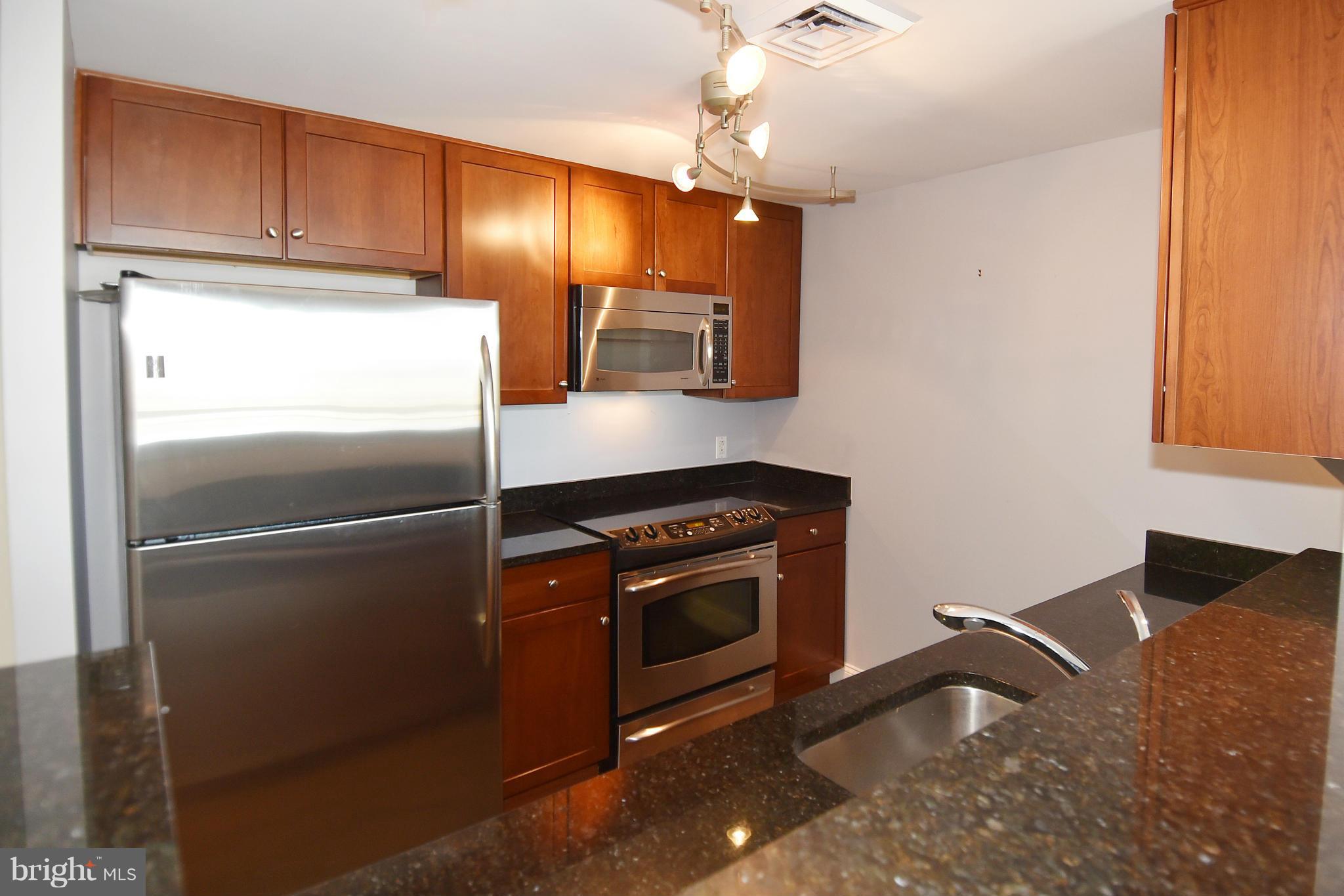 THE PHOENIX CONDOMINIUMS - Residential Lease