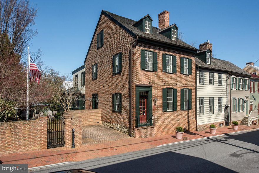 TWO perfect 18th c. houses, #38 Cornhill, with its' own guest house, #40 Cornhill, the most expensive and finest renovations in Annapolis. Every beautiful room shines w/authenticity. Great views of State House, Navy Chapel & across the Bay. No detail  overlooked in gorgeous main kitchen, w/ a sunny solarium open to the delightful walled Savannah garden. Parking,of course! Just steps to City Dock.