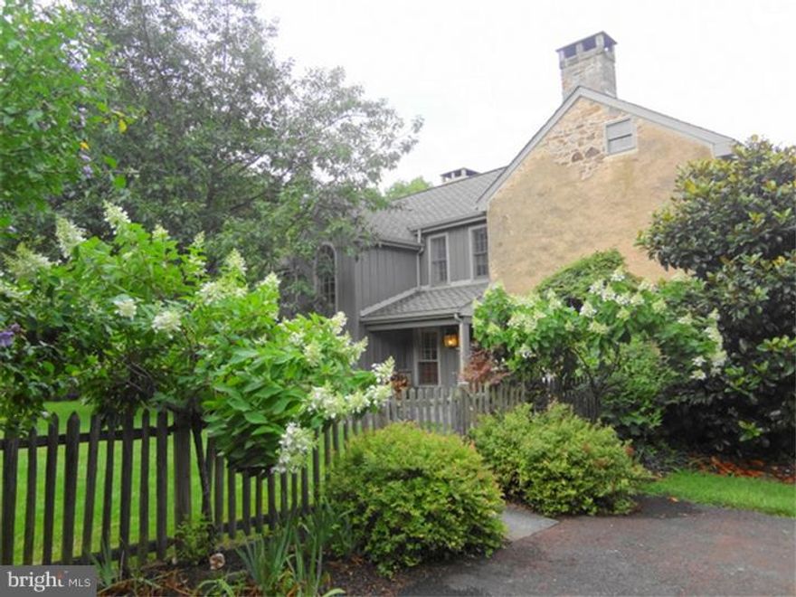 This exceptional property includes a convenient location, sophistication, history and a blending of a classic stone antique farmhouse with a tasteful cedar addition showcasing the home's extraordinary amenities. Nothing has been omitted to make this a gracious, comfortable place for family living and entertaining. Exposed stone walls, bluestone and wide plank flooring, walk in fireplaces, handcrafted iron hardware, beamed and soaring ceilings, and a chef's custom dream kitchen are only a few of the details that set this house apart. A barn with enormous great room, bath and overhead lofted bedroom with views of the spring house ruins, reminder of bygone days, standing sentinal over the spring fed pond and perennial gardens. In ground pool, stone walls and patios, potting shed w/fenced garden and detached garage with heated office combine with the gently rolling countryside to make this a private, one-of-a-kind property. It doesn't get better than this! Additional 4th  bedroom and bathroom in the Barn